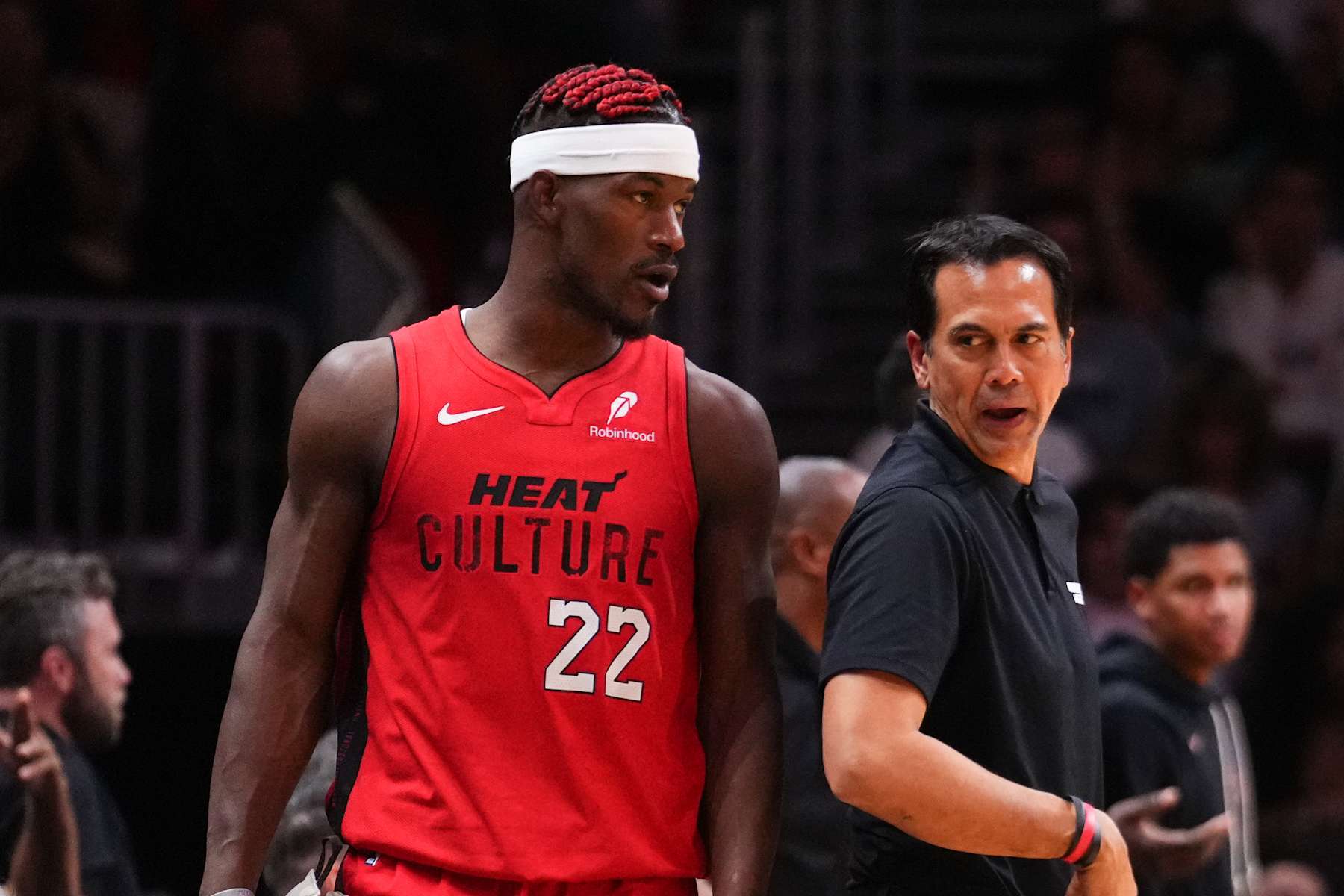 MIAMI, FLORIDA - NOVEMBER 24: Jimmy Butler #22 speaks to Head coach Erik Spoelstra of the Miami Heat during the fourth quarter against the Dallas Mavericks at Kaseya Center on November 24, 2024 in Miami, Florida. NOTE TO USER: User expressly acknowledges and agrees that, by downloading and or using this photograph, User is consenting to the terms and conditions of the Getty Images License Agreement. (Photo by Rich Storry/Getty Images)