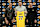Slovenian basketball player Luka Doncic (C) holds up a jersey as he stands alongside Los Angeles Lakers head coach JJ Redick (R) and Los Angeles Lakers general manager Rob Pelinka during a press conference introducing Doncic as the newest member of the Los Angeles Lakers, at the UCLA Health Training Center, in El Segundo, California on February 4, 2025. Slovenian star Luka Doncic said February 2, 2025 he thought he'd spend his entire NBA career in Dallas, thanking fans in Texas for making it feel like home a day after the Mavericks abruptly traded him to the Los Angeles Lakers. (Photo by Patrick T. Fallon / AFP) (Photo by PATRICK T. FALLON/AFP via Getty Images)