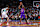 TORONTO, CANADA - FEBRUARY 5: Davion Mitchell #45 of the Toronto Raptors handles the ball during the game against the Memphis Grizzlies on February 5, 2025 at the Scotiabank Arena in Toronto, Ontario, Canada. NOTE TO USER: User expressly acknowledges and agrees that, by downloading and or using this Photograph, user is consenting to the terms and conditions of the Getty Images License Agreement. Mandatory Copyright Notice: Copyright 2025 NBAE (Photo by Vaughn Ridley/NBAE via Getty Images)