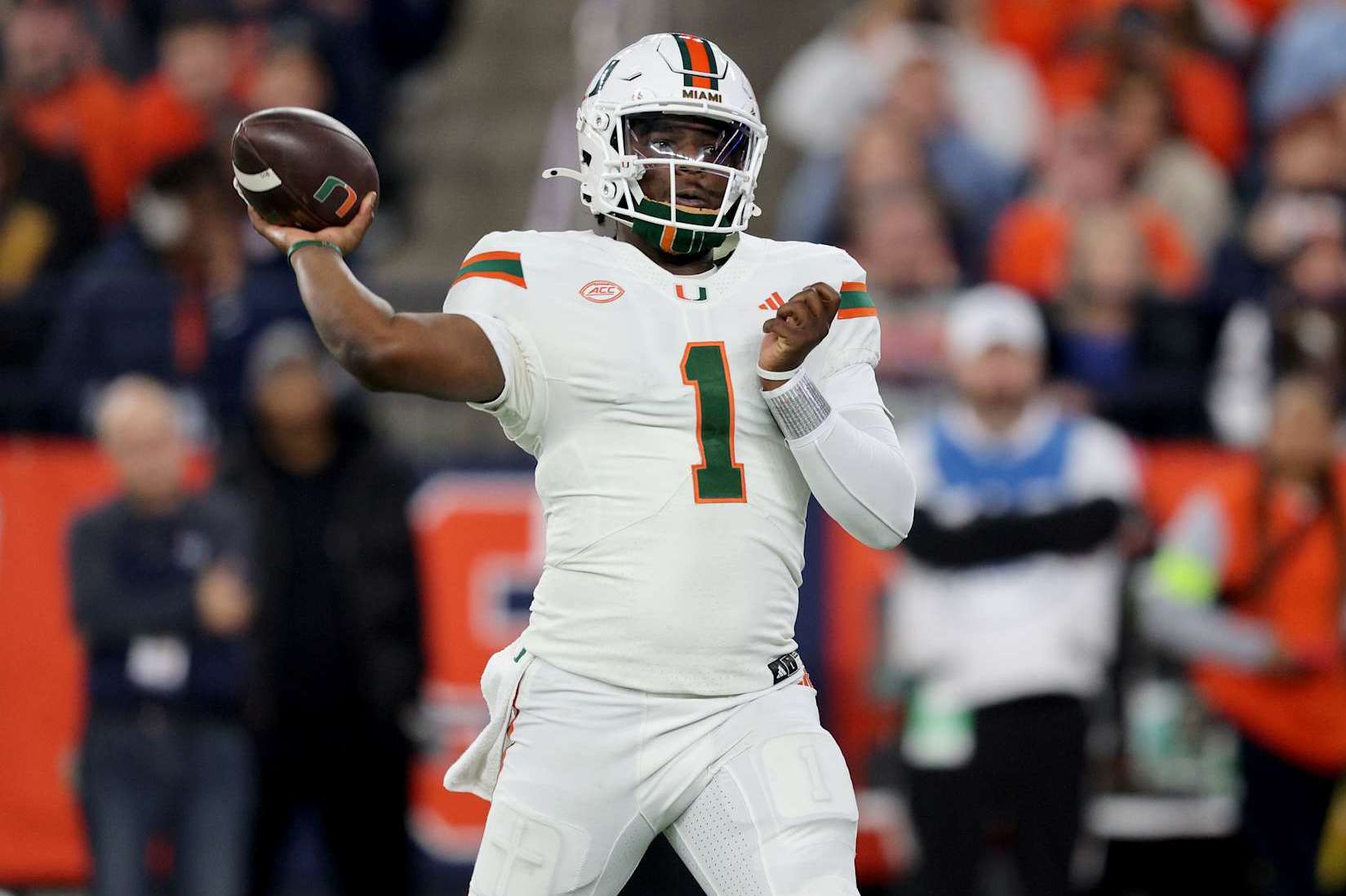 SYRACUSE, NEW YORK - NOVEMBER 30: Cam Ward #1 of the Miami Hurricanes throws a pass during the second quarter against the Syracuse Orange at JMA Wireless Dome on November 30, 2024 in Syracuse, New York. (Photo by Bryan M. Bennett/Getty Images)