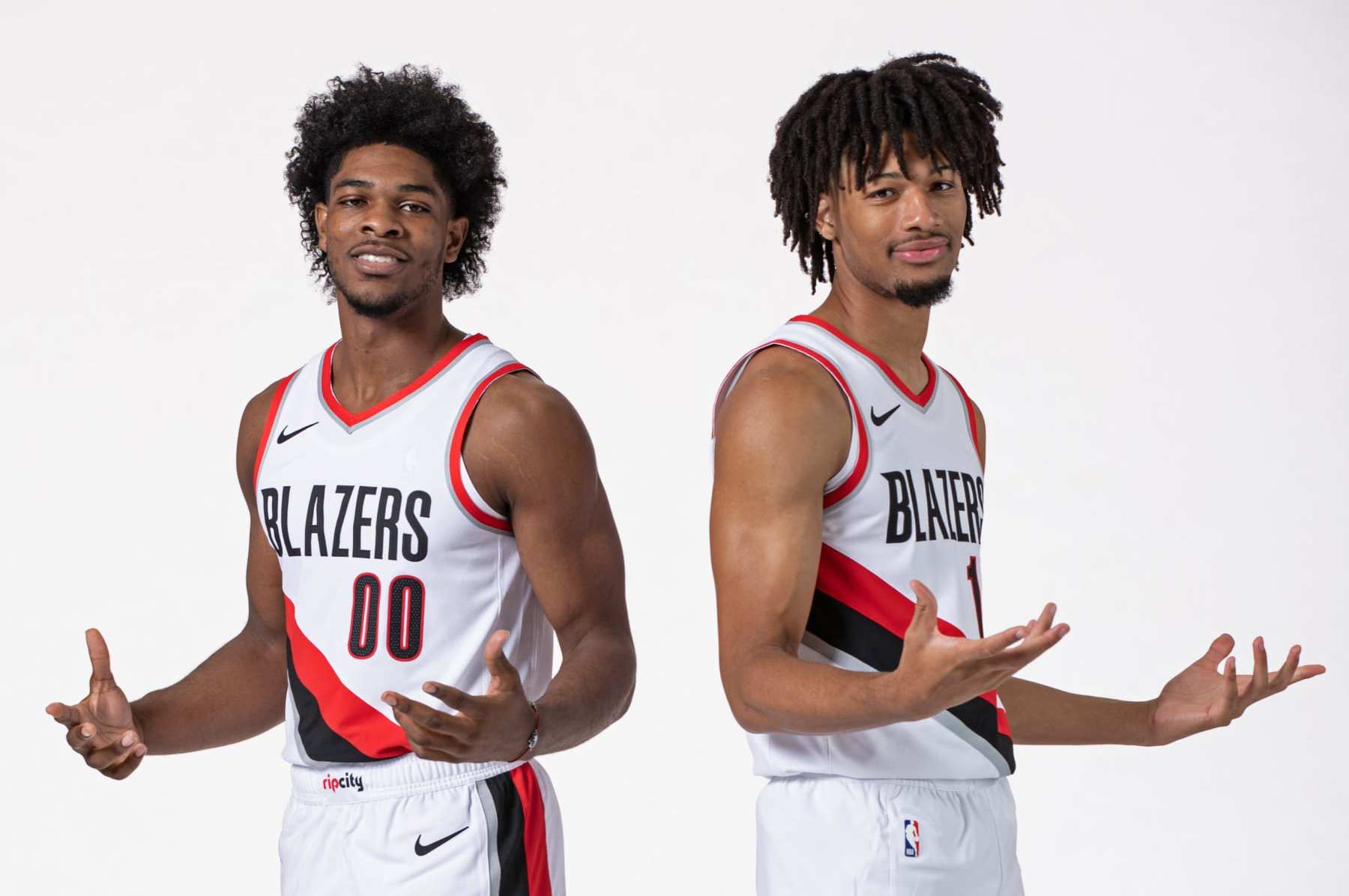 PORTLAND, OR - OCTOBER 2: Scoot Henderson #00 and Shaedon Sharpe #17 of the Portland Trail Blazers poses for a portrait during 2023-24 NBA Media Day on October 2, 2023 at the Moda Center Arena in Portland, Oregon. NOTE TO USER: User expressly acknowledges and agrees that, by downloading and or using this photograph, user is consenting to the terms and conditions of the Getty Images License Agreement. Mandatory Copyright Notice: Copyright 2023 NBAE (Photo by Cameron Browne/NBAE via Getty Images)