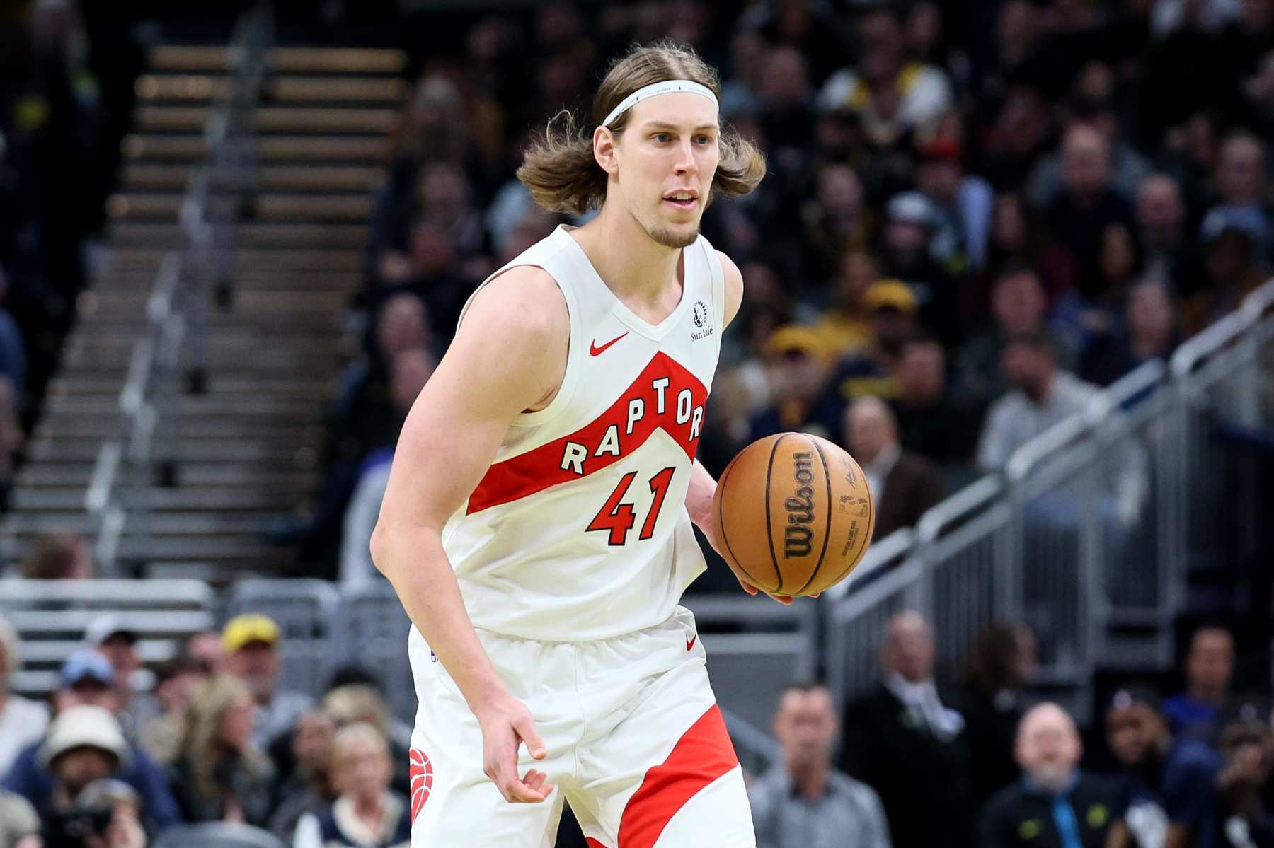 INDIANAPOLIS, INDIANA - FEBRUARY 26:  Kelly Olynyk #41 of the Toronto Raptors dribbles the ball while against the Indiana Pacers at Gainbridge Fieldhouse on February 26, 2024 in Indianapolis, Indiana.    NOTE TO USER: User expressly acknowledges and agrees that, by downloading and or using this photograph, User is consenting to the terms and conditions of the Getty Images License Agreement.  (Photo by Andy Lyons/Getty Images)