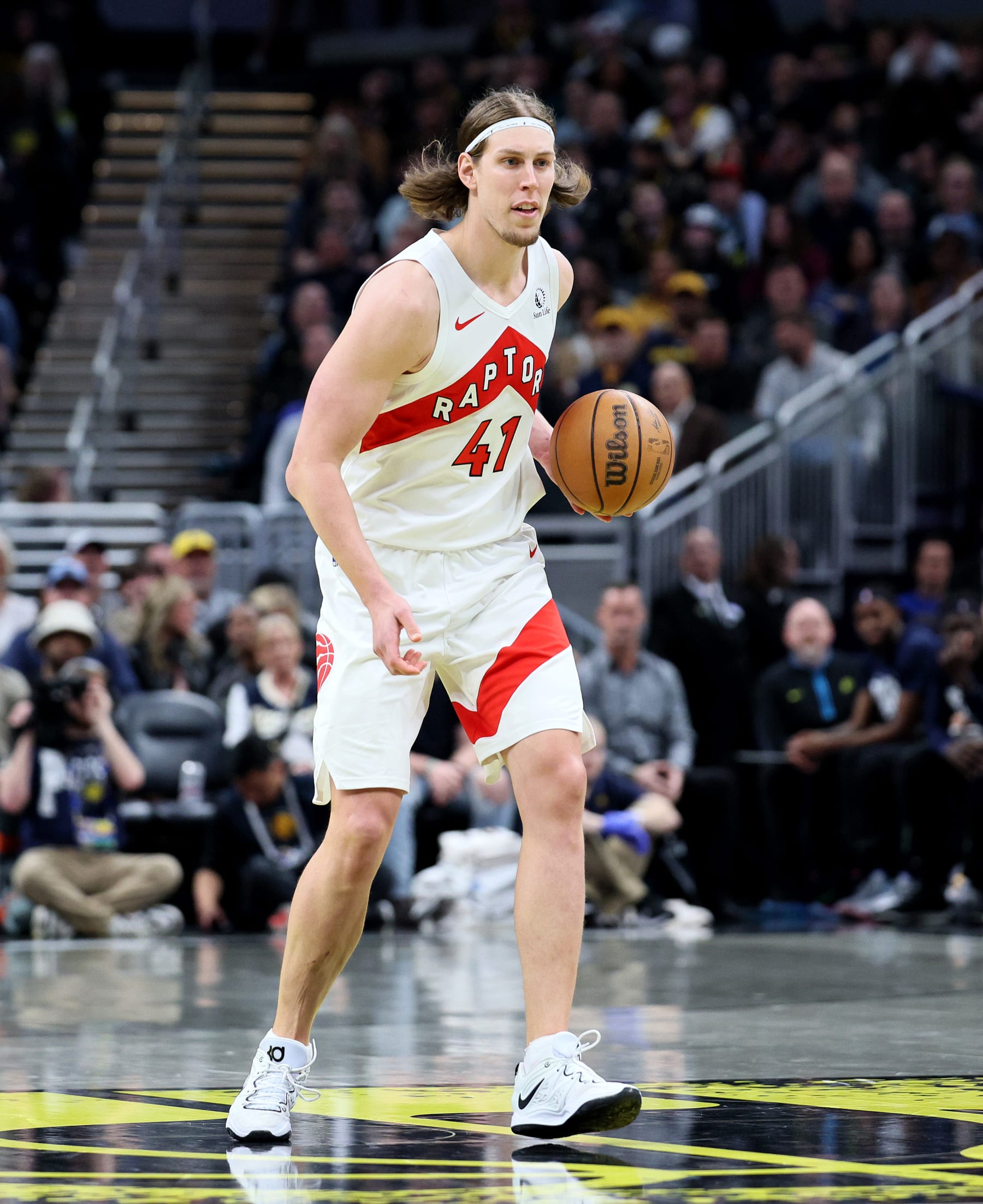 INDIANAPOLIS, INDIANA - FEBRUARY 26:  Kelly Olynyk #41 of the Toronto Raptors dribbles the ball while against the Indiana Pacers at Gainbridge Fieldhouse on February 26, 2024 in Indianapolis, Indiana.    NOTE TO USER: User expressly acknowledges and agrees that, by downloading and or using this photograph, User is consenting to the terms and conditions of the Getty Images License Agreement.  (Photo by Andy Lyons/Getty Images)