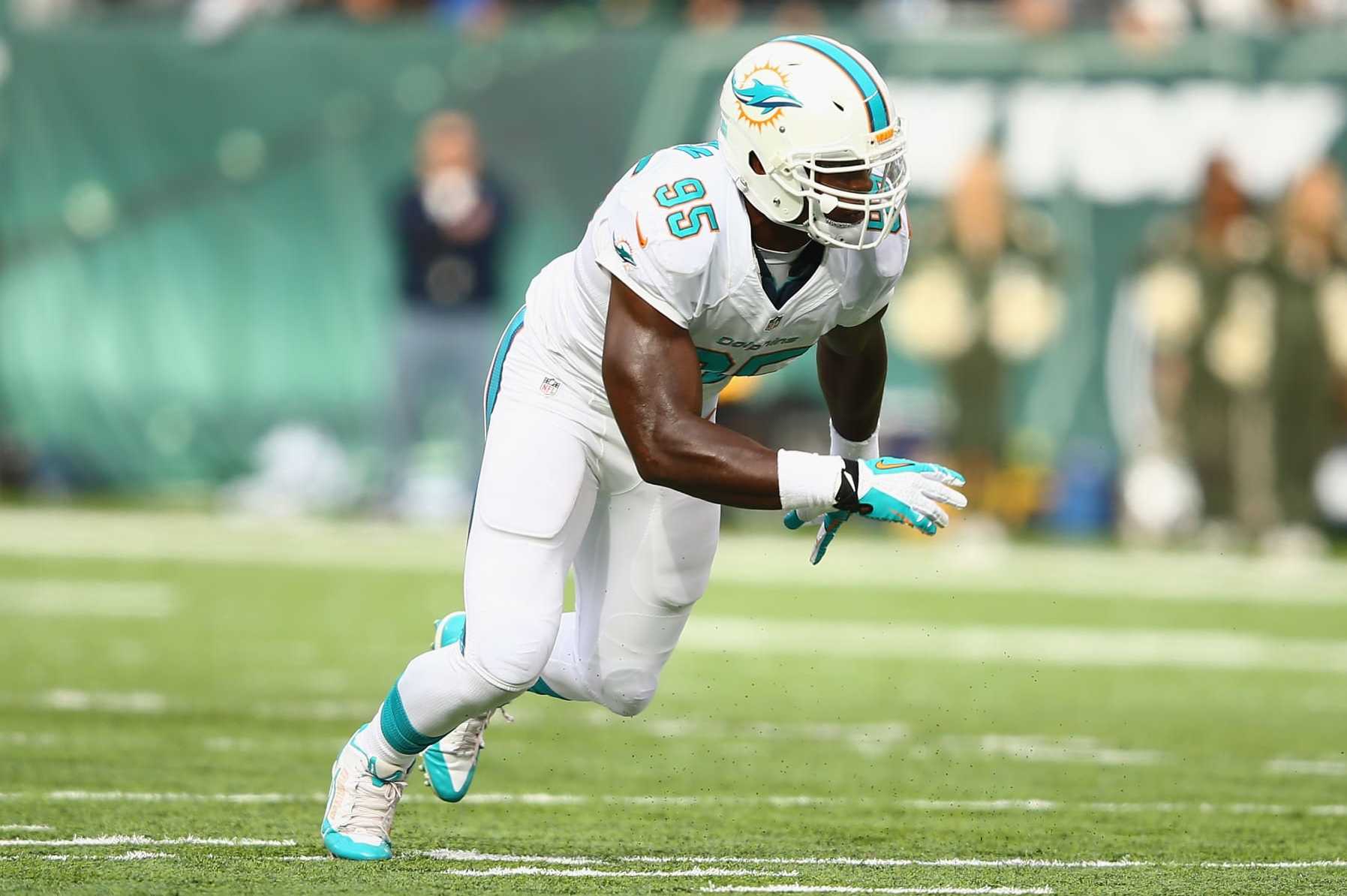EAST RUTHERFORD, NJ - DECEMBER 01: Dion Jordan #95 of the Miami Dolphins in action against the New York Jets during their game at MetLife Stadium on December 1, 2013 in East Rutherford, New Jersey. (Photo by Al Bello/Getty Images)