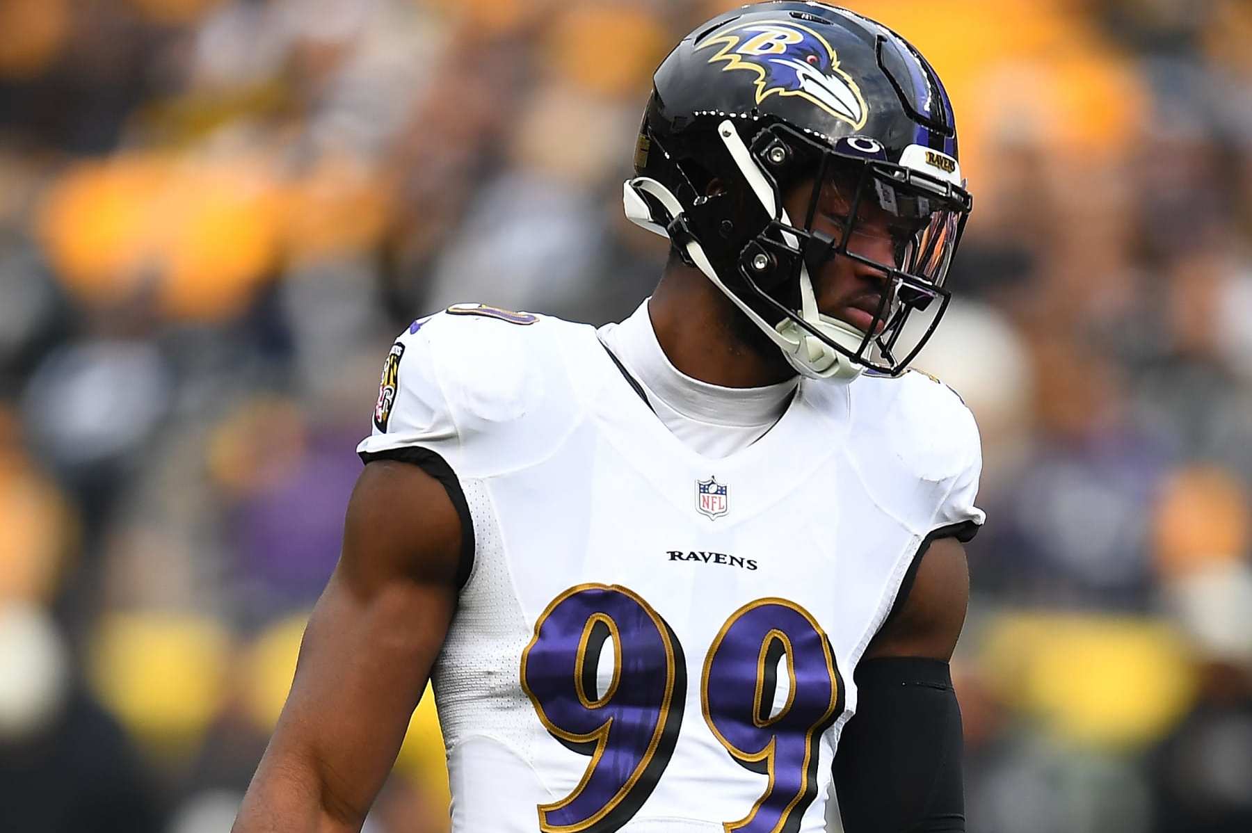 Baltimore Ravens linebacker Odafe Oweh (99) looks on during the