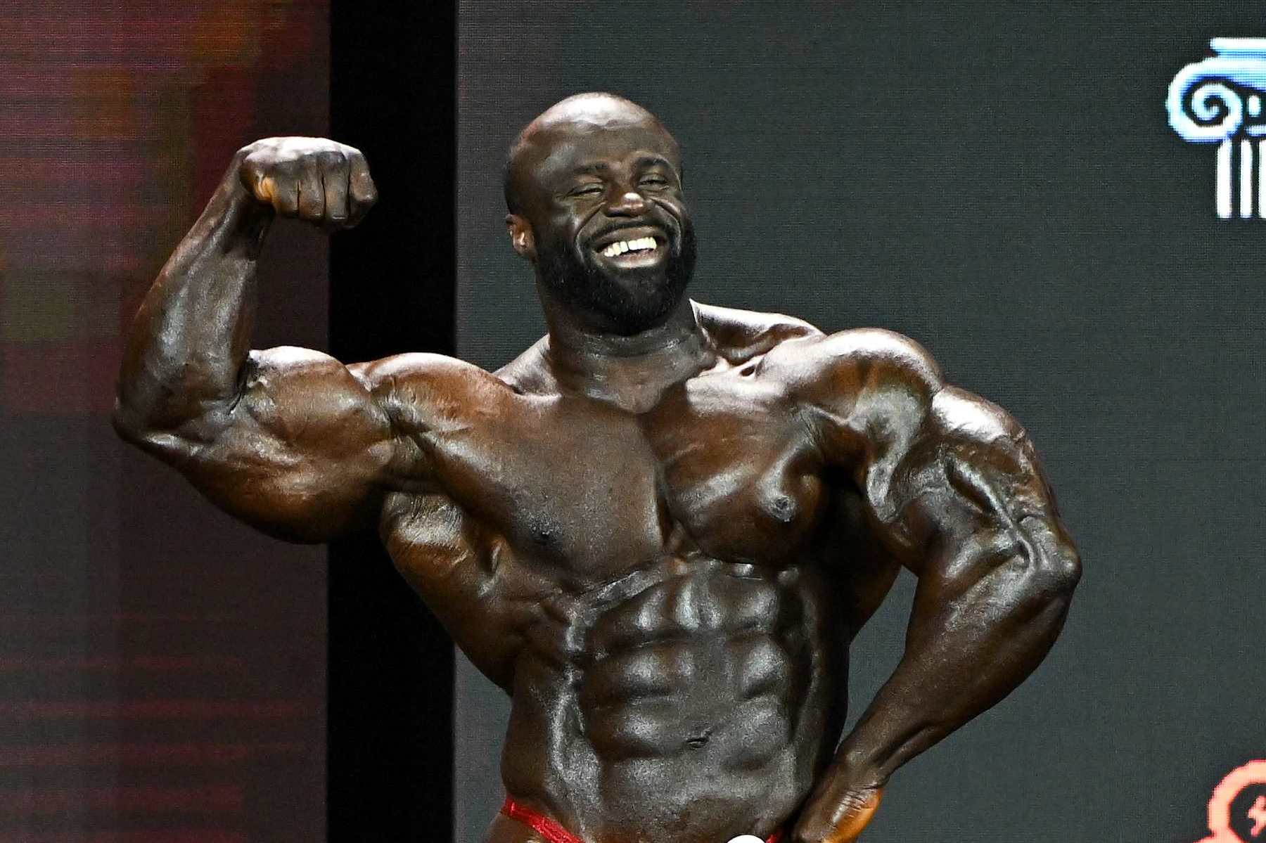 LAS VEGAS, NEVADA - DECEMBER 17, 2022: Samson Dauda competes in the Mr. Olympia event during the Olympia Fitness & Performance weekend at Planet Hollywood Resort and Casino on December 17, 2022 in Las Vegas, Nevada. (Photo by Chris Bernacchi/Diamond Images via Getty Images)