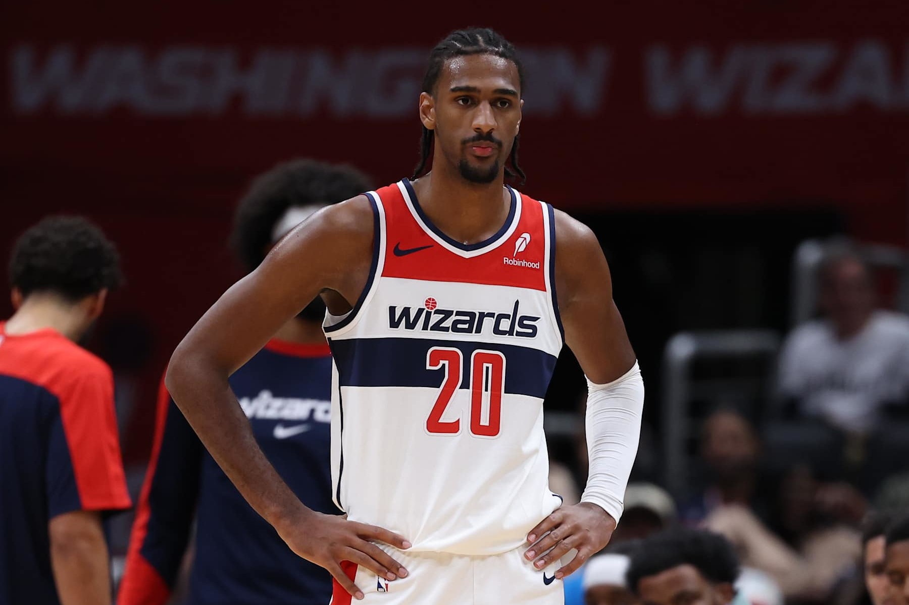 WASHINGTON, DC - OCTOBER 11: Alex Sarr #20 of the Washington Wizards looks on against the Toronto Raptors during the first half of a preseason game at Capital One Arena on October 11, 2024 in Washington, DC. NOTE TO USER: User expressly acknowledges and agrees that, by downloading and or using this photograph, User is consenting to the terms and conditions of the Getty Images License Agreement. (Photo by Patrick Smith/Getty Images)