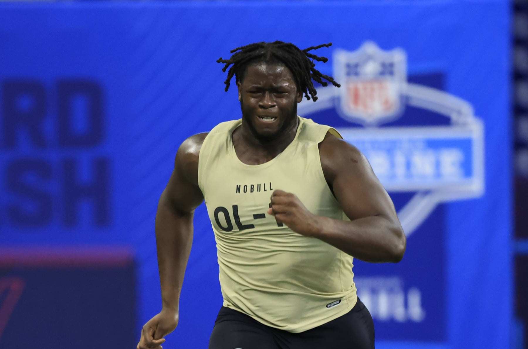 INDIANAPOLIS, INDIANA - MARCH 03: Olu Fashanu #OL18 of the Penn State participates in the 40 yard dash during the NFL Combine at Lucas Oil Stadium on March 03, 2024 in Indianapolis, Indiana. (Photo by Justin Casterline/Getty Images)
