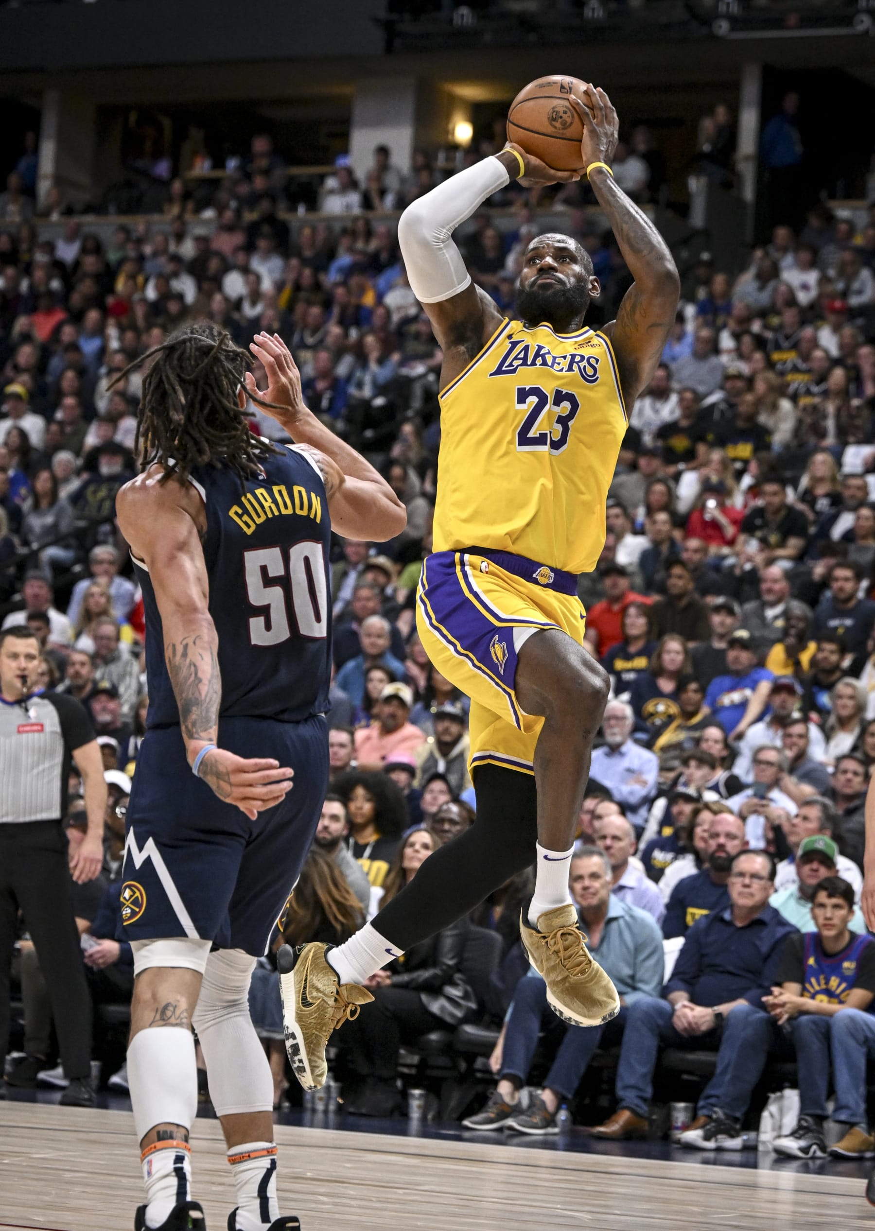 DENVER, CO - APRIL 29: LeBron James (23) of the Los Angeles Lakers misses a shot as Aaron Gordon (50) of the Denver Nuggets defends during the second quarter at Ball Arena in Denver, Colorado on Monday, April 29, 2024. (Photo by AAron Ontiveroz/The Denver Post)