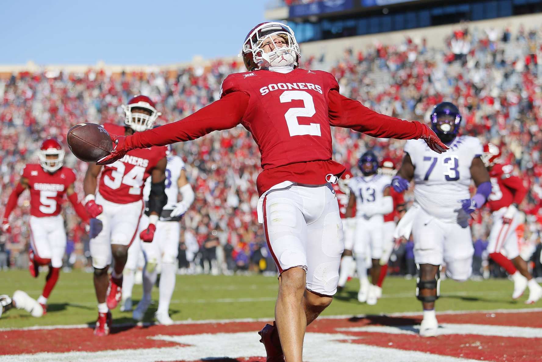 NORMAN, OKLAHOMA - NOVEMBER 24: Defensive back Billy Bowman Jr. #2 of the Oklahoma Sooners scores a touchdown on a 45-yard interception return against the TCU Horned Frogs in the fourth quarter at Gaylord Family Oklahoma Memorial Stadium on November 24, 2023 in Norman, Oklahoma. Oklahoma won 69-45. (Photo by Brian Bahr/Getty Images)