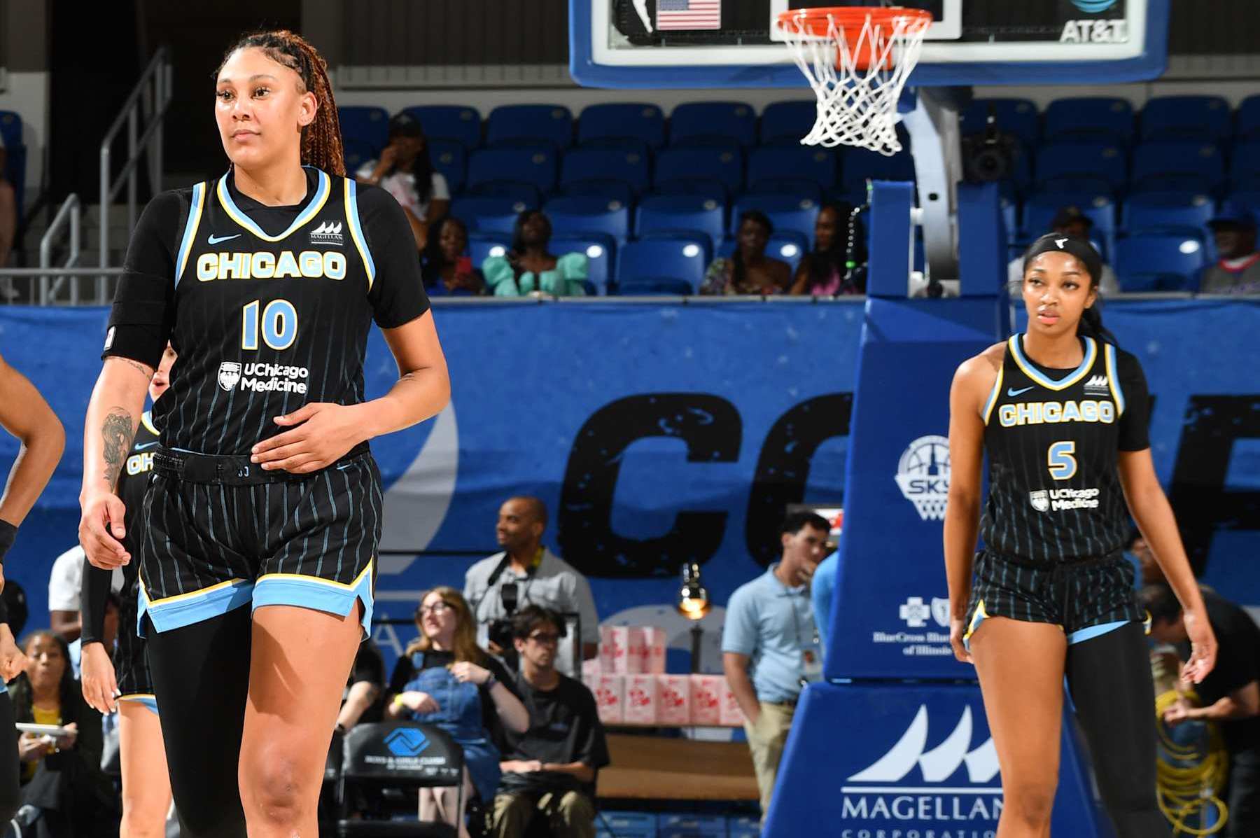 CHICAGO, IL - JUNE 12: Kamilla Cardoso #10 and Angel Reese #5 of the Chicago Sky looks on during the game against the Connecticut Sun on June 12, 2024 at the Wintrust Arena in Chicago, IL. NOTE TO USER: User expressly acknowledges and agrees that, by downloading and or using this photograph, User is consenting to the terms and conditions of the Getty Images License Agreement. Mandatory Copyright Notice: Copyright 2024 NBAE (Photo by Randy Belice/NBAE via Getty Images)