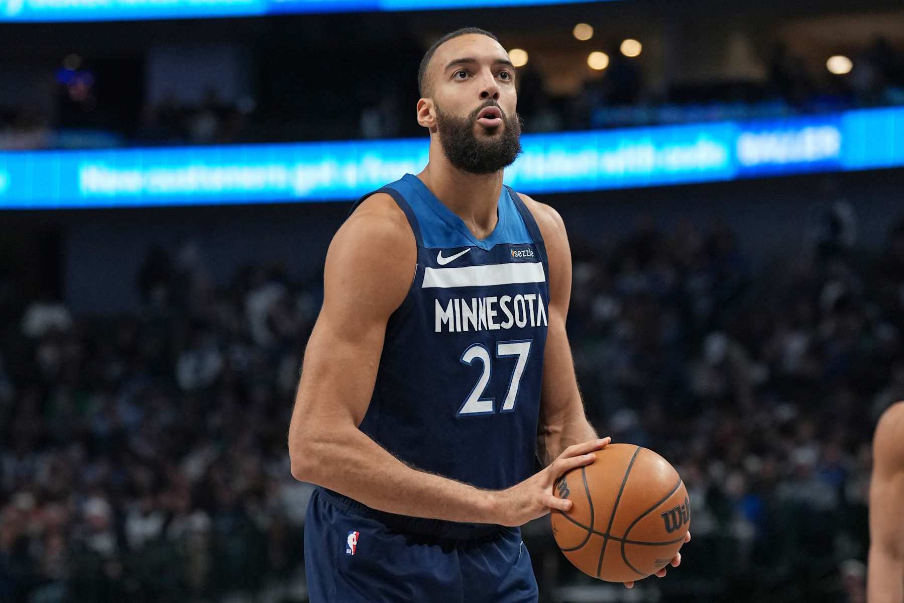 DALLAS, TX - JANUARY 22: Rudy Gobert #27 of the Minnesota Timberwolves shoots a free throw during the game against the Dallas Mavericks on January 22, 2025 at American Airlines Center in Dallas, Texas. NOTE TO USER: User expressly acknowledges and agrees that, by downloading and or using this photograph, User is consenting to the terms and conditions of the Getty Images License Agreement. Mandatory Copyright Notice: Copyright 2025 NBAE (Photo by Glenn James/NBAE via Getty Images)