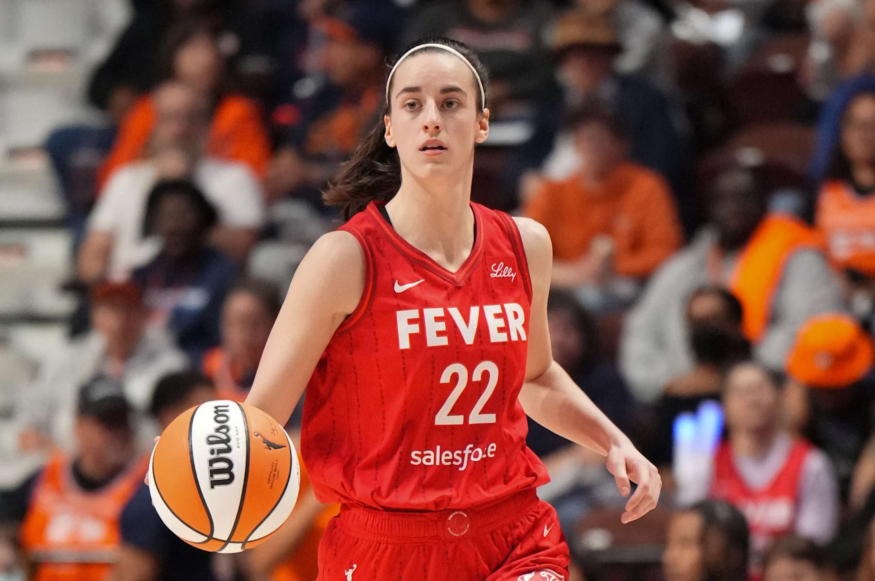 UNCASVILLE, CT - SEPTEMBER 25: Caitlin Clark #22 of the Indiana Fever dribbles the ball during the game against the Connecticut Sun during Round one Game two of the 2024 WNBA Playoffs on September 25, 2024 at the Mohegan Sun Arena in Uncasville, Connecticut. NOTE TO USER: User expressly acknowledges and agrees that, by downloading and or using this photograph, User is consenting to the terms and conditions of the Getty Images License Agreement. Mandatory Copyright Notice: Copyright 2024 NBAE (Photo by Jesse D. Garrabrant/NBAE via Getty Images)