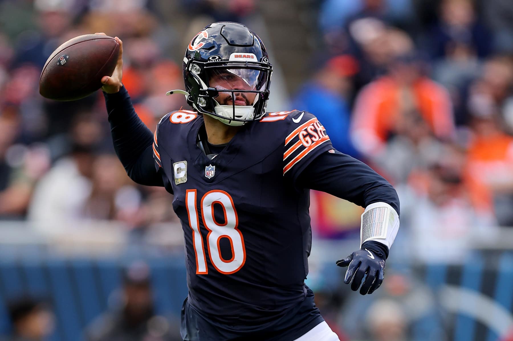 CHICAGO, ILLINOIS - NOVEMBER 10: Caleb Williams #18 of the Chicago Bears passes the ball against the New England Patriots during the second quarter at Soldier Field on November 10, 2024 in Chicago, Illinois. (Photo by Michael Reaves/Getty Images)