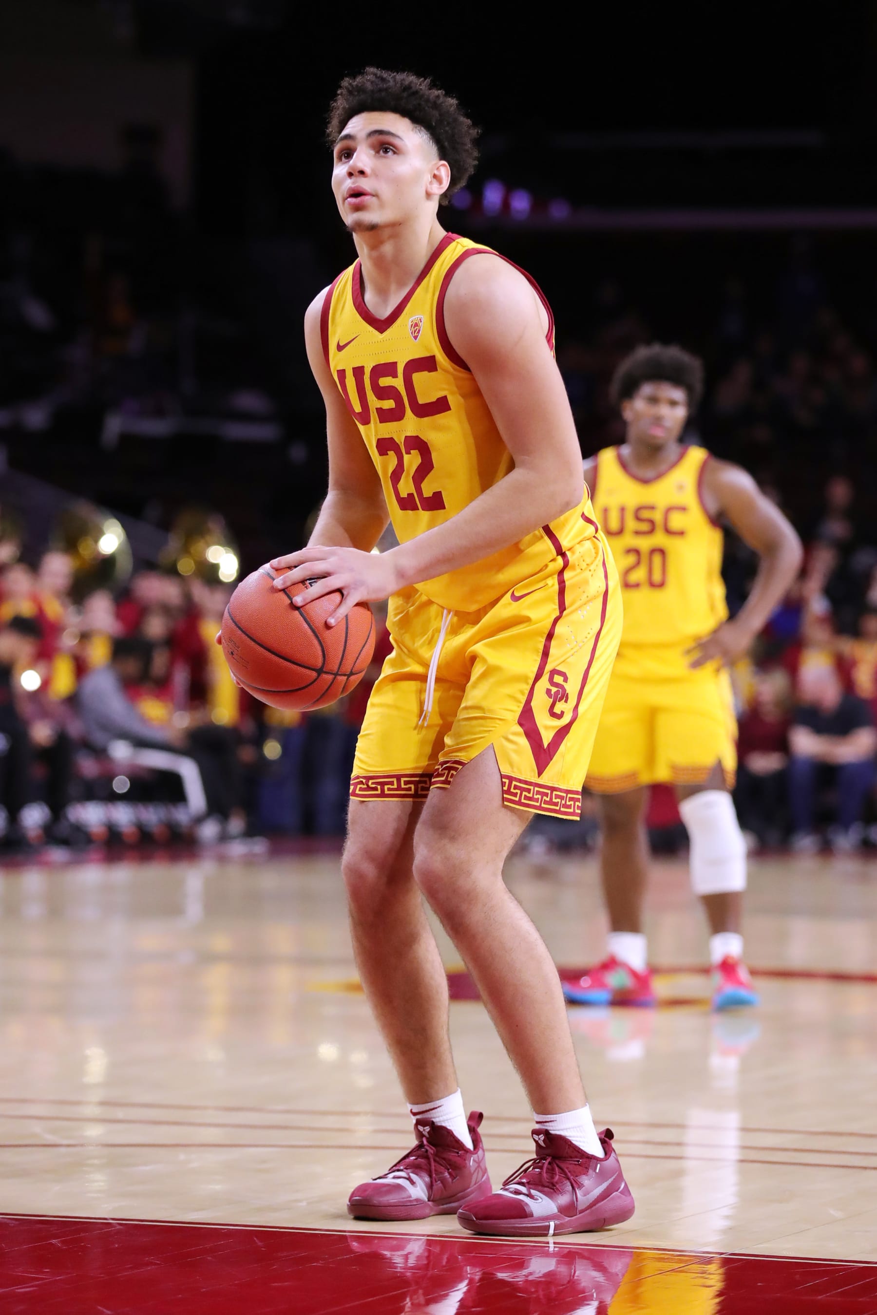 LOS ANGELES, CALIFORNIA - FEBRUARY 15: Drake London #22 of the USC Trojans shooting free throw against the Washington State Cougars during a college basketball game at Galen Center on February 15, 2020 in Los Angeles, California. (Photo by Leon Bennett/Getty Images)