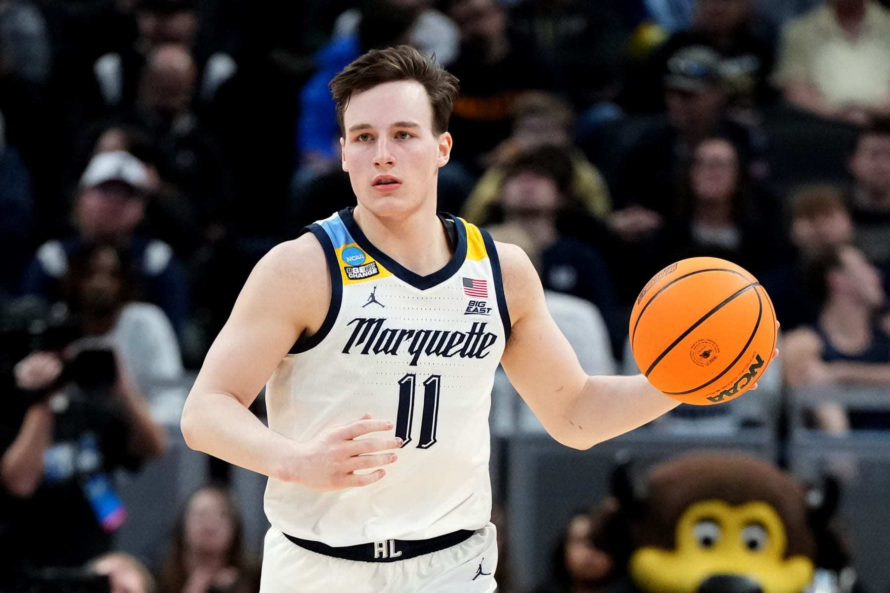 INDIANAPOLIS, INDIANA - MARCH 24: Tyler Kolek #11 of the Marquette Golden Eagles dribbles the ball during the Second Round NCAA Men's Basketball Tournament game against the Colorado Buffaloes at Gainbridge Fieldhouse on March 24, 2024 in Indianapolis, Indiana. (Photo by Mitchell Layton/Getty Images)