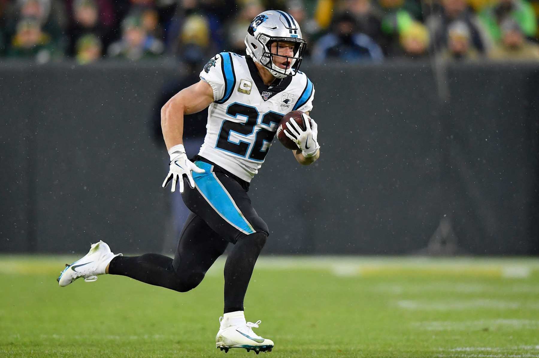 GREEN BAY, WISCONSIN - NOVEMBER 10: Christian McCaffrey #22 of the Carolina Panthers runs with the football against the Green Bay Packers at Lambeau Field on November 10, 2019 in Green Bay, Wisconsin. (Photo by Quinn Harris/Getty Images)