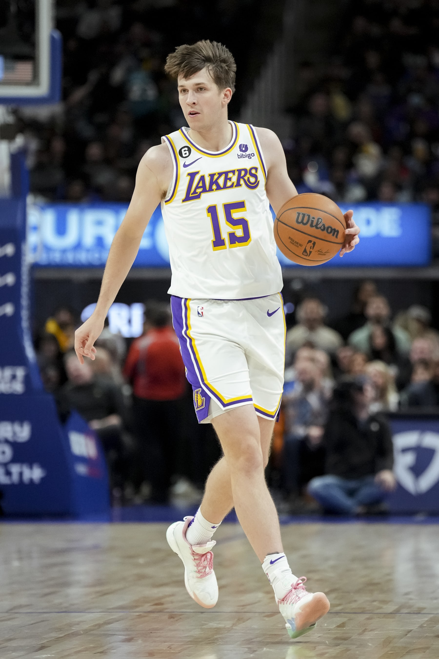 DETROIT, MICHIGAN - DECEMBER 11: Austin Reaves #15 of the Los Angeles Lakers handles the ball against the Detroit Pistons at Little Caesars Arena on December 11, 2022 in Detroit, Michigan. NOTE TO USER: User expressly acknowledges and agrees that, by downloading and or using this photograph, User is consenting to the terms and conditions of the Getty Images License Agreement. (Photo by Nic Antaya/Getty Images)
