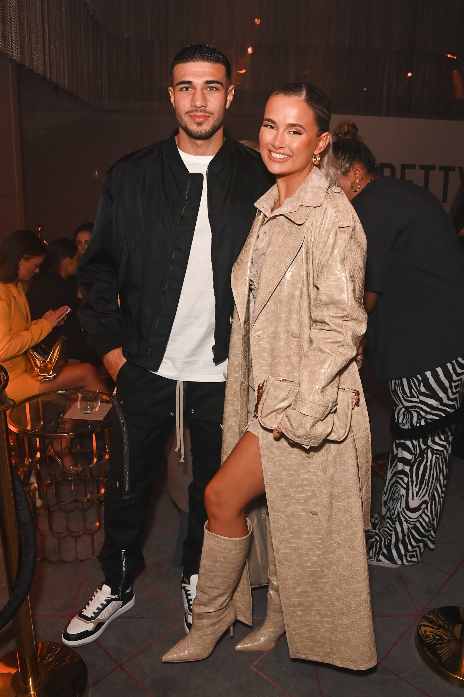 LONDON, ENGLAND - FEBRUARY 16: Tommy Fury and Molly-Mae Hague attend the PrettyLittleThing X Molly-Mae show at The Londoner Hotel on February 16, 2022 in London, England. (Photo by David M. Benett/Dave Benett/Getty Images for PrettyLittleThing)
