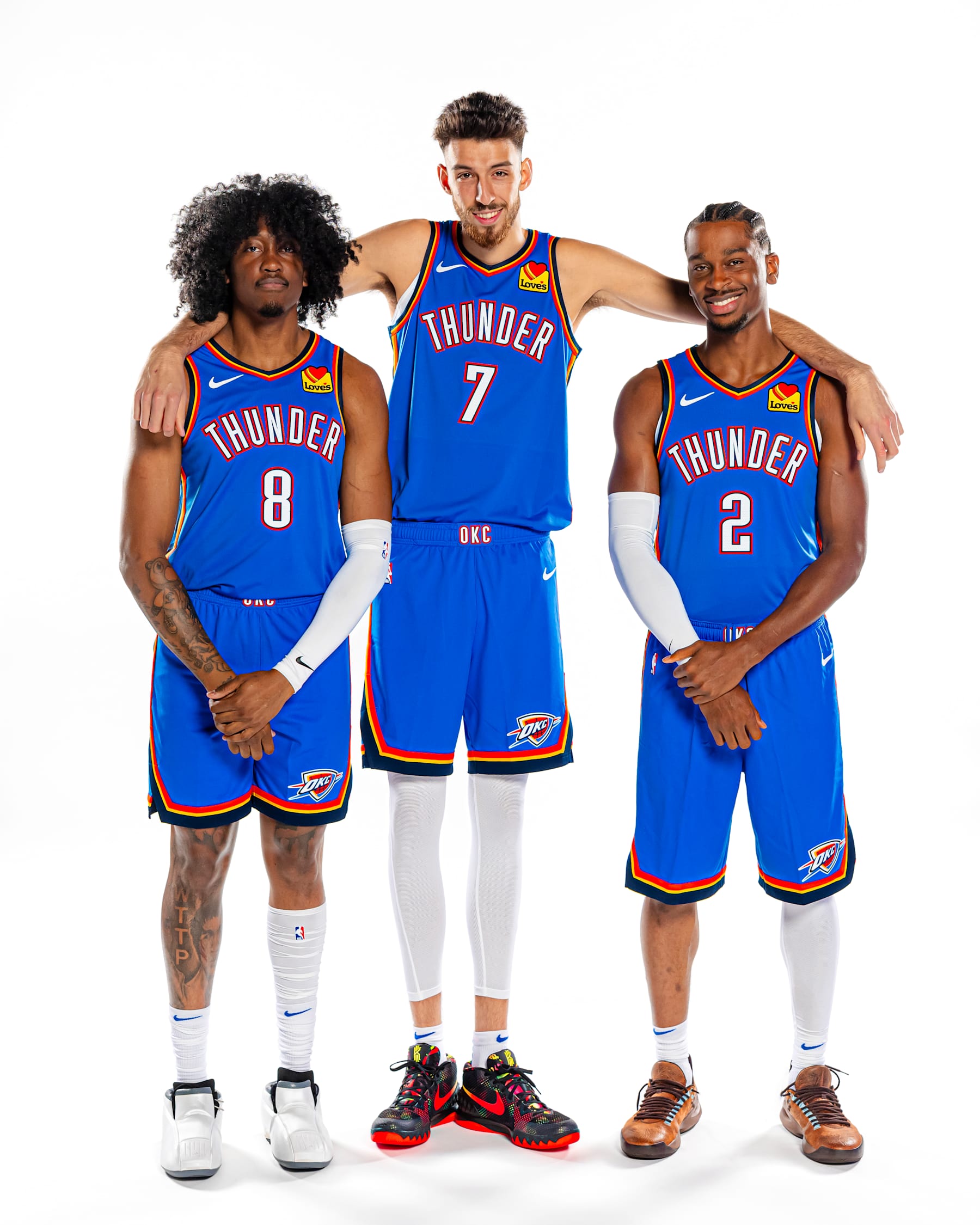 OKLAHOMA CITY, OKLAHOMA - SEPT 30: Jalen Williams #8, Chet Holmgren #7 and Shai Gilgeous-Alexander #2 of the Oklahoma City Thunder poses for a portrait during 2024 NBA Media Day on September 30, 2024 at the Paycom Center in Oklahoma City, Oklahoma. NOTE TO USER: User expressly acknowledges and agrees that, by downloading and/or using this Photograph, user is consenting to the terms and conditions of the Getty Images License Agreement. Mandatory Copyright Notice: Copyright 2024 NBAE (Photo by Zach Beeker/NBAE via Getty Images)