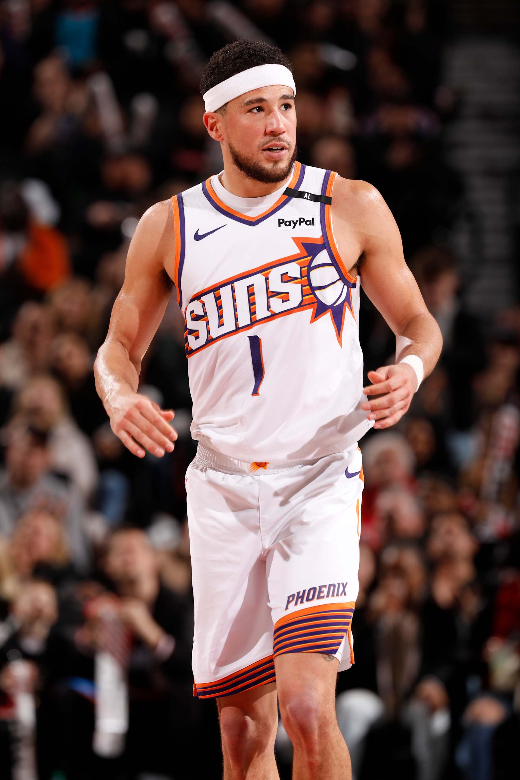 PORTLAND, OR - FEBRUARY 3:  Devin Booker #1 of the Phoenix Suns looks on during the game against the Portland Trail Blazers on February 3, 2025 at the Moda Center Arena in Portland, Oregon. NOTE TO USER: User expressly acknowledges and agrees that, by downloading and or using this photograph, user is consenting to the terms and conditions of the Getty Images License Agreement. Mandatory Copyright Notice: Copyright 2025 NBAE (Photo by Cameron Browne/NBAE via Getty Images)