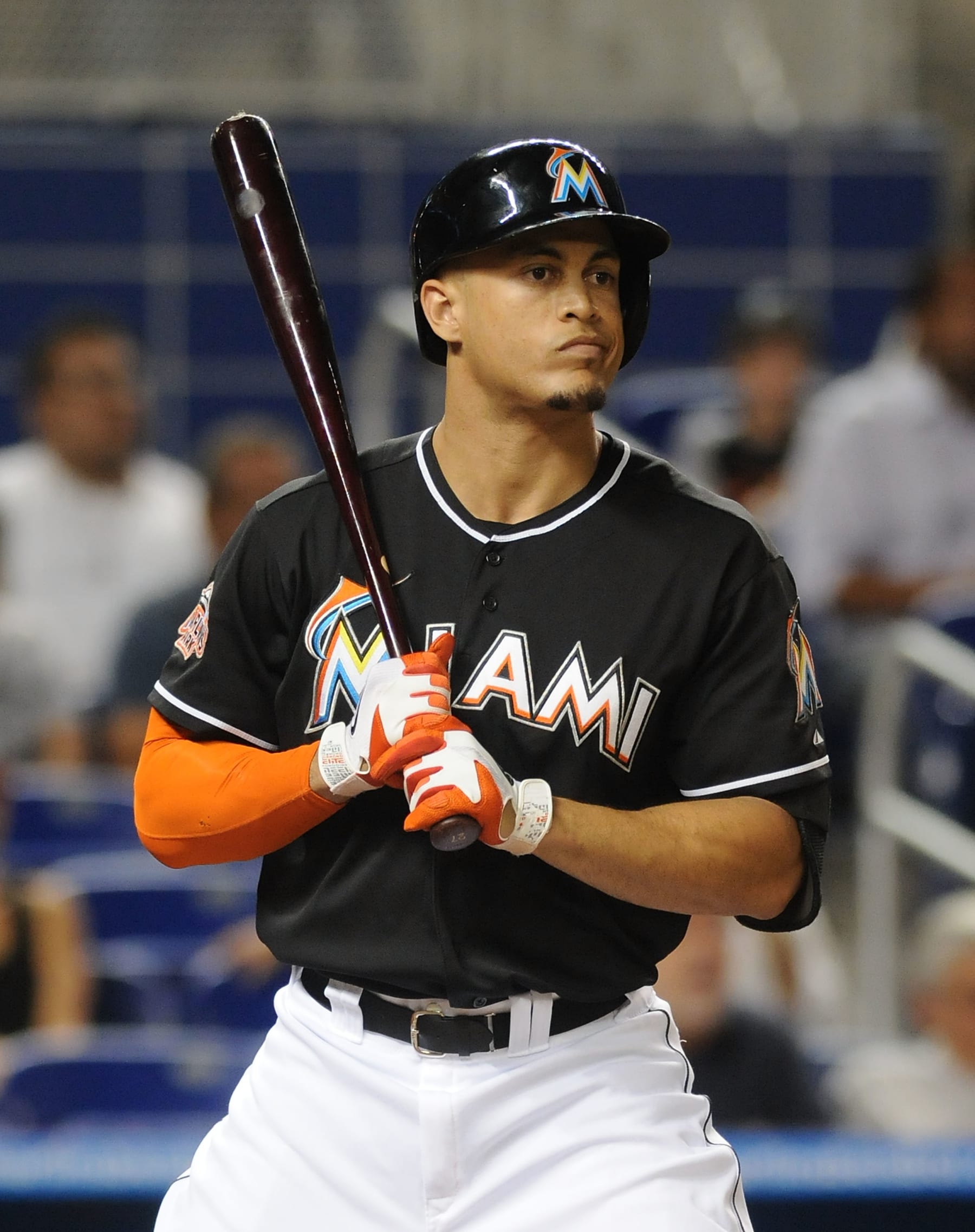 MIAMI, FL - SEPTEMBER 14:  Giancarlo Stanton #27 of the Florida Marlins prepares prior to a game against the Cincinnati Reds at Marlins Park on September 14, 2012 in Miami, Florida.  (Photo by Jason Arnold/Getty Images)