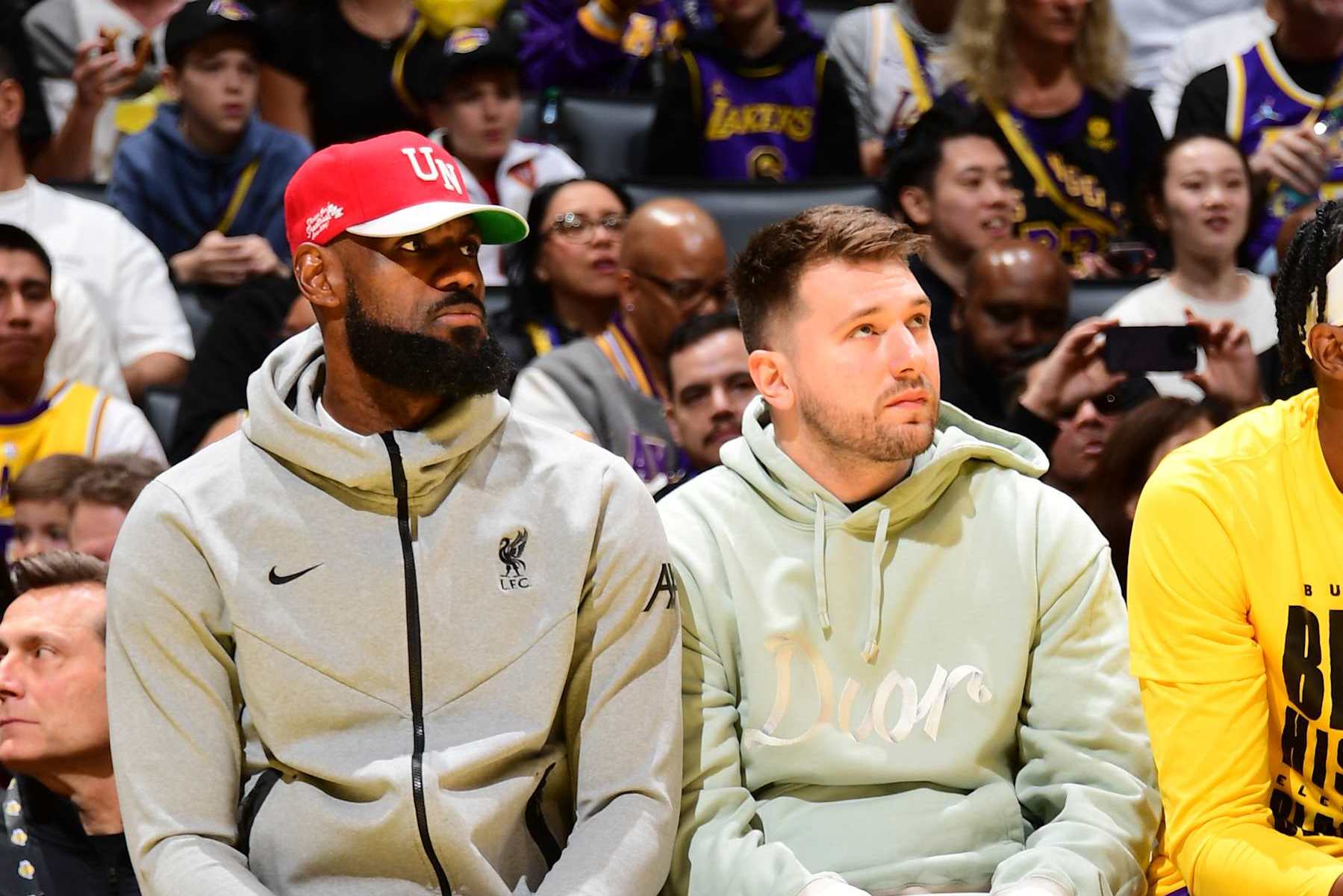 LOS ANGELES, CA - FEBRUARY 8: LeBron James #23 and Luka Doncic #77 of the Los Angeles Lakers looks on during the game against the Indiana Pacers on February 8, 2025 at Crypto.Com Arena in Los Angeles, California. NOTE TO USER: User expressly acknowledges and agrees that, by downloading and/or using this Photograph, user is consenting to the terms and conditions of the Getty Images License Agreement. Mandatory Copyright Notice: Copyright 2025 NBAE (Photo by Adam Pantozzi/NBAE via Getty Images)