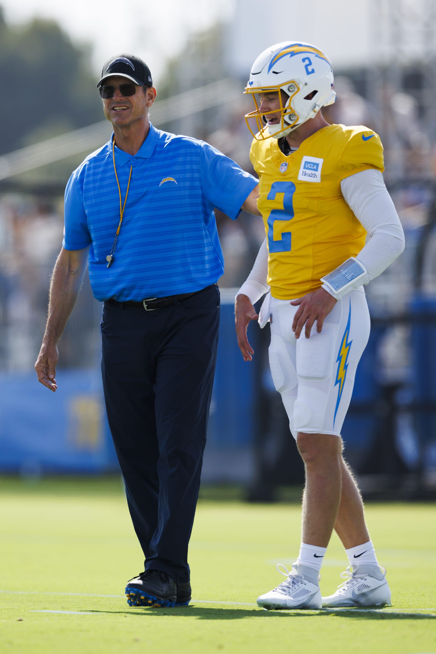 Head coach Jim Harbaugh and backup quarterback Easton Stick