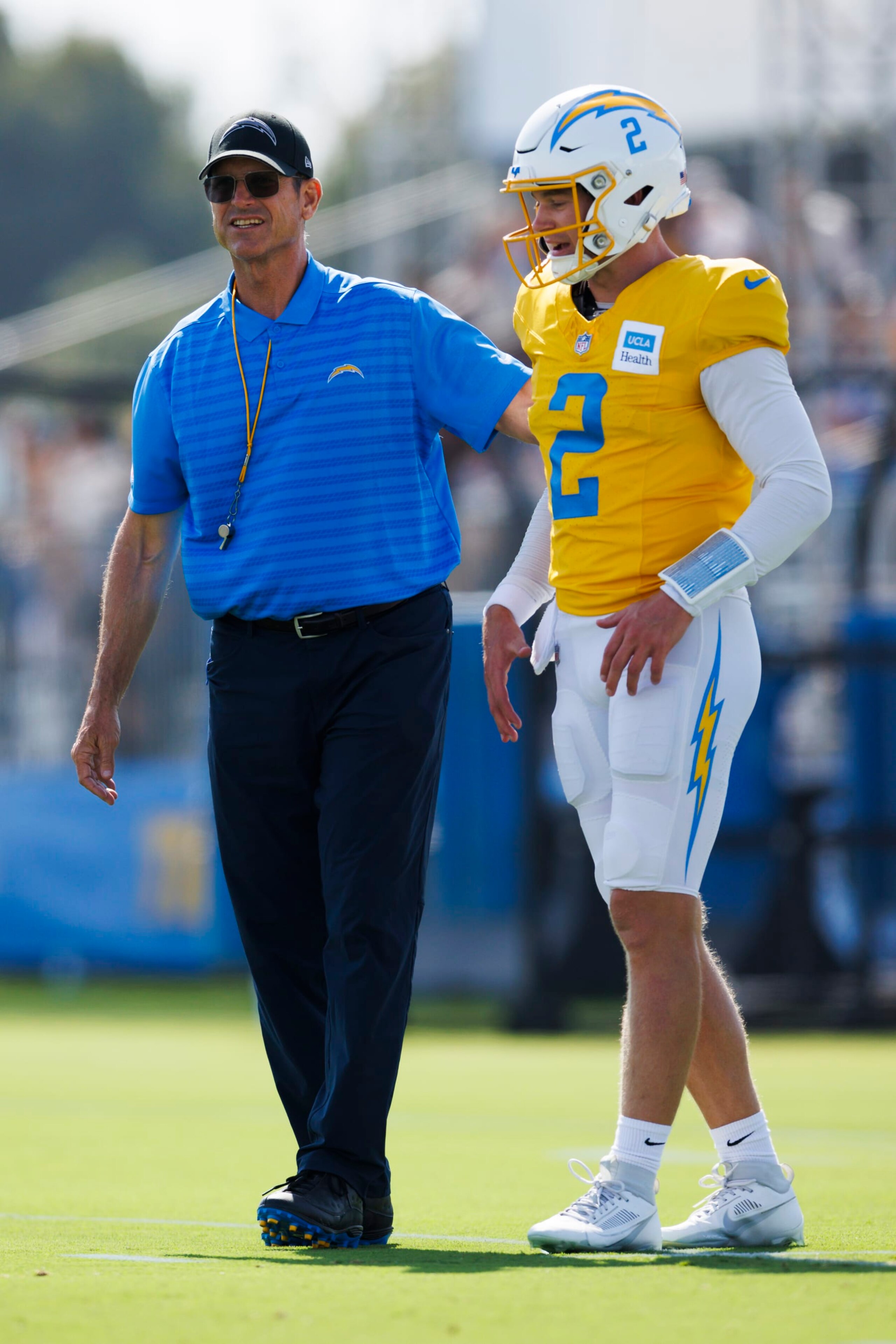 Head coach Jim Harbaugh and backup quarterback Easton Stick