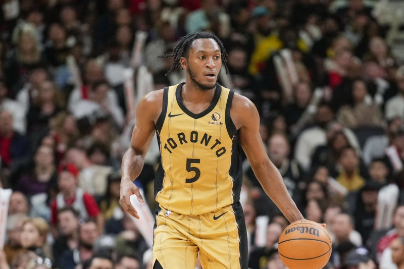 TORONTO, ON - APRIL 7: Immanuel Quickley #5 of the Toronto Raptors dribbles against the Washington Wizards during the second half of their basketball game at the Scotiabank Arena on April 7, 2024 in Toronto, Ontario, Canada. NOTE TO USER: User expressly acknowledges and agrees that, by downloading and/or using this Photograph, user is consenting to the terms and conditions of the Getty Images License Agreement. (Photo by Mark Blinch/Getty Images)