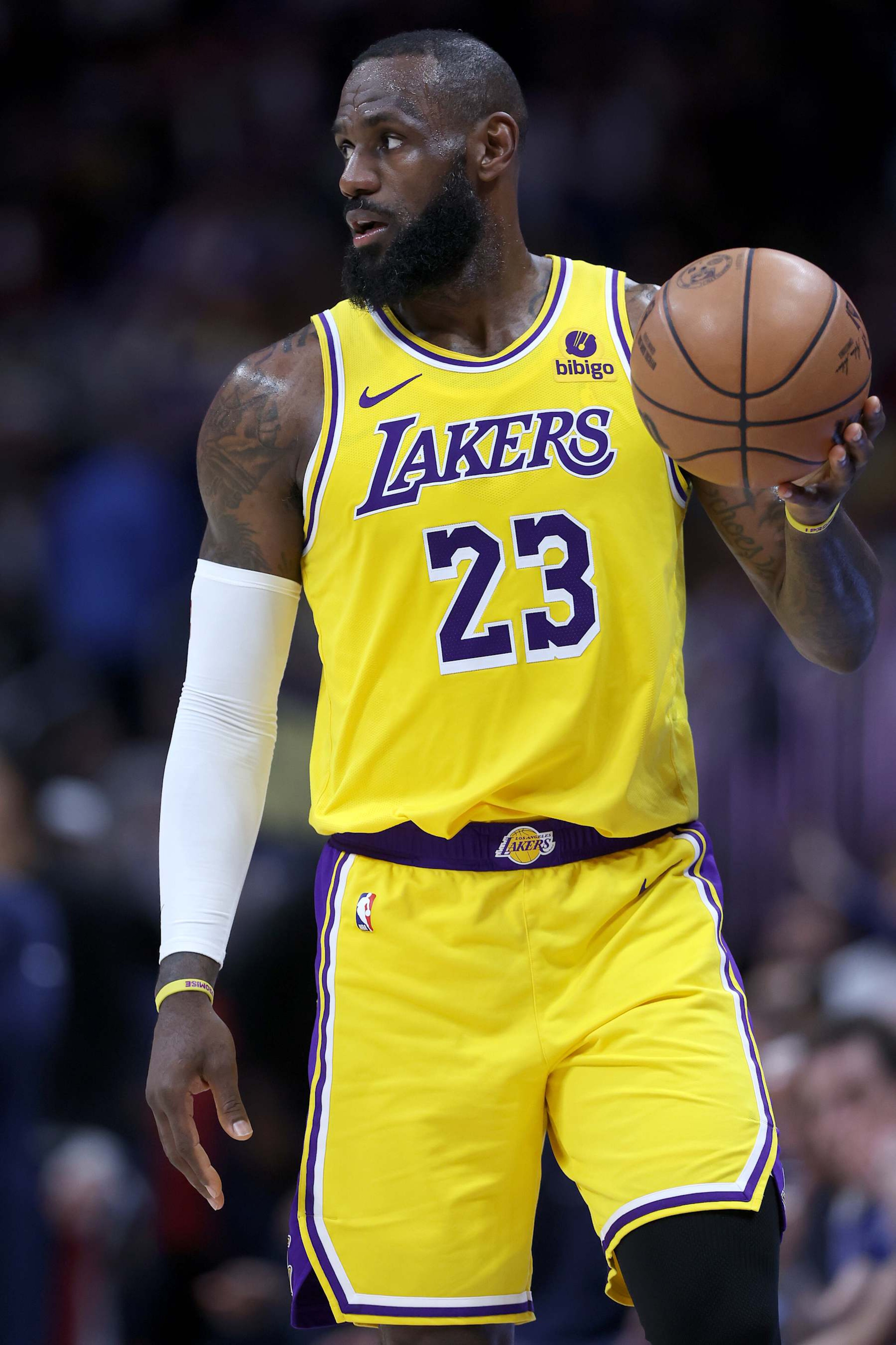 DENVER, COLORADO - APRIL 29: LeBron James #23 of the Los Angeles Lakers brings the ball down the court against the Denver Nuggets in the third quarter during game five of the Western Conference First Round Playoffs at Ball Arena on April 29, 2024 in Denver, Colorado. NOTE TO USER: User expressly acknowledges and agrees that, by downloading and or using this photograph, User is consenting to the terms and conditions of the Getty Images License Agreement.  (Photo by Matthew Stockman/Getty Images)