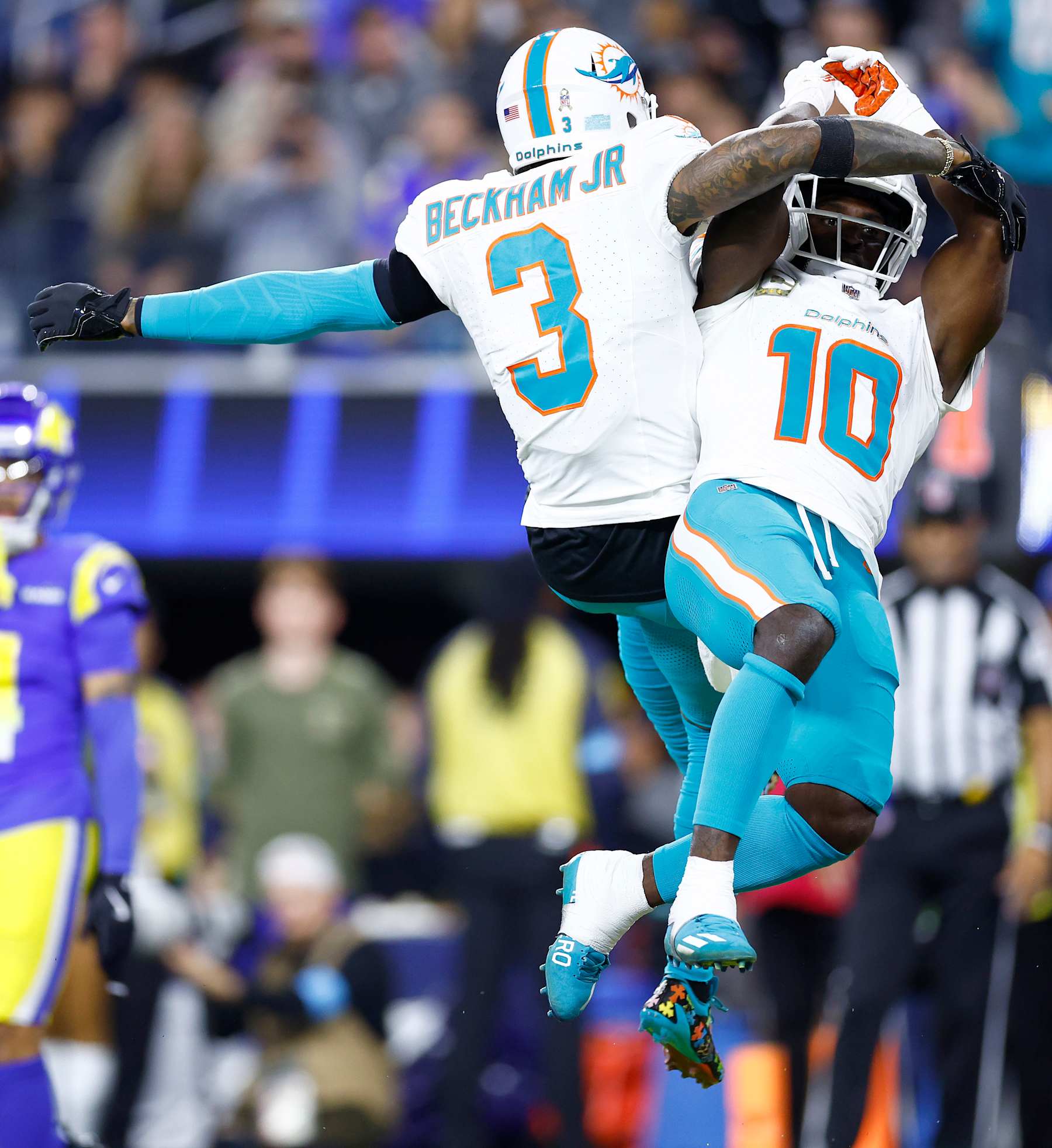 INGLEWOOD, CALIFORNIA - NOVEMBER 11: Tyreek Hill #10 of the Miami Dolphins celebrates with Odell Beckham Jr. #3 after scoring a touchdown against the Los Angeles Rams during the third quarter in the game at SoFi Stadium on November 11, 2024 in Inglewood, California. (Photo by Ronald Martinez/Getty Images)