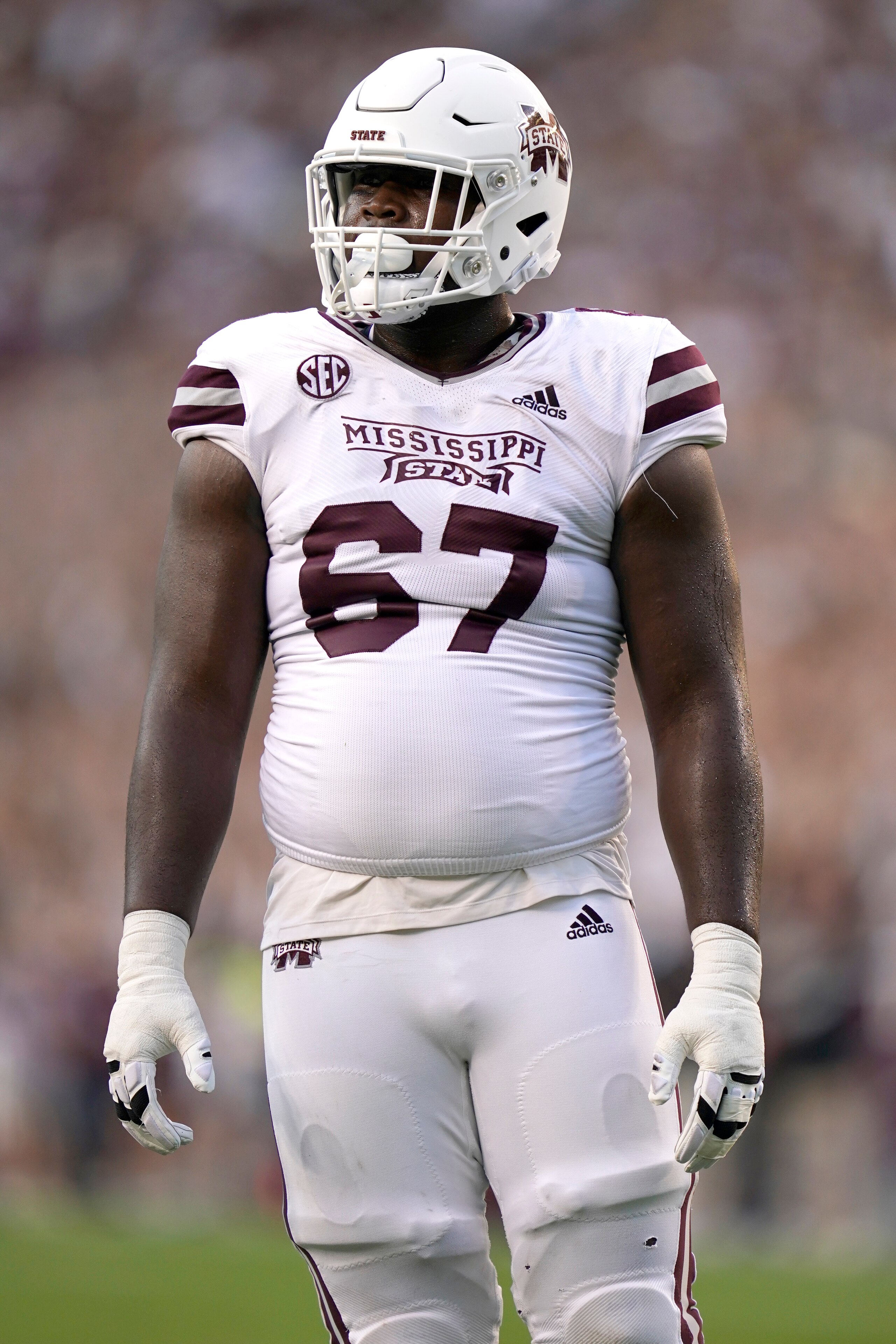 Mississippi State offensive lineman Charles Cross (67) watches as Texas A&M sets up during the first half of an NCAA college football game on Saturday, Oct. 2, 2021, in College Station, Texas. (AP Photo/Sam Craft)