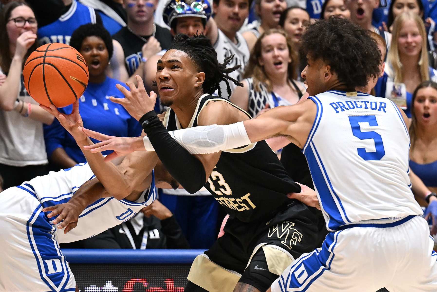 DURHAM, NORTH CAROLINA - FEBRUARY 12: Tyrese Proctor #5 of the Duke Blue Devils defends Hunter Sallis #23 of the Wake Forest Demon Deaconsduring the first half of the game at Cameron Indoor Stadium on February 12, 2024 in Durham, North Carolina. (Photo by Grant Halverson/Getty Images)