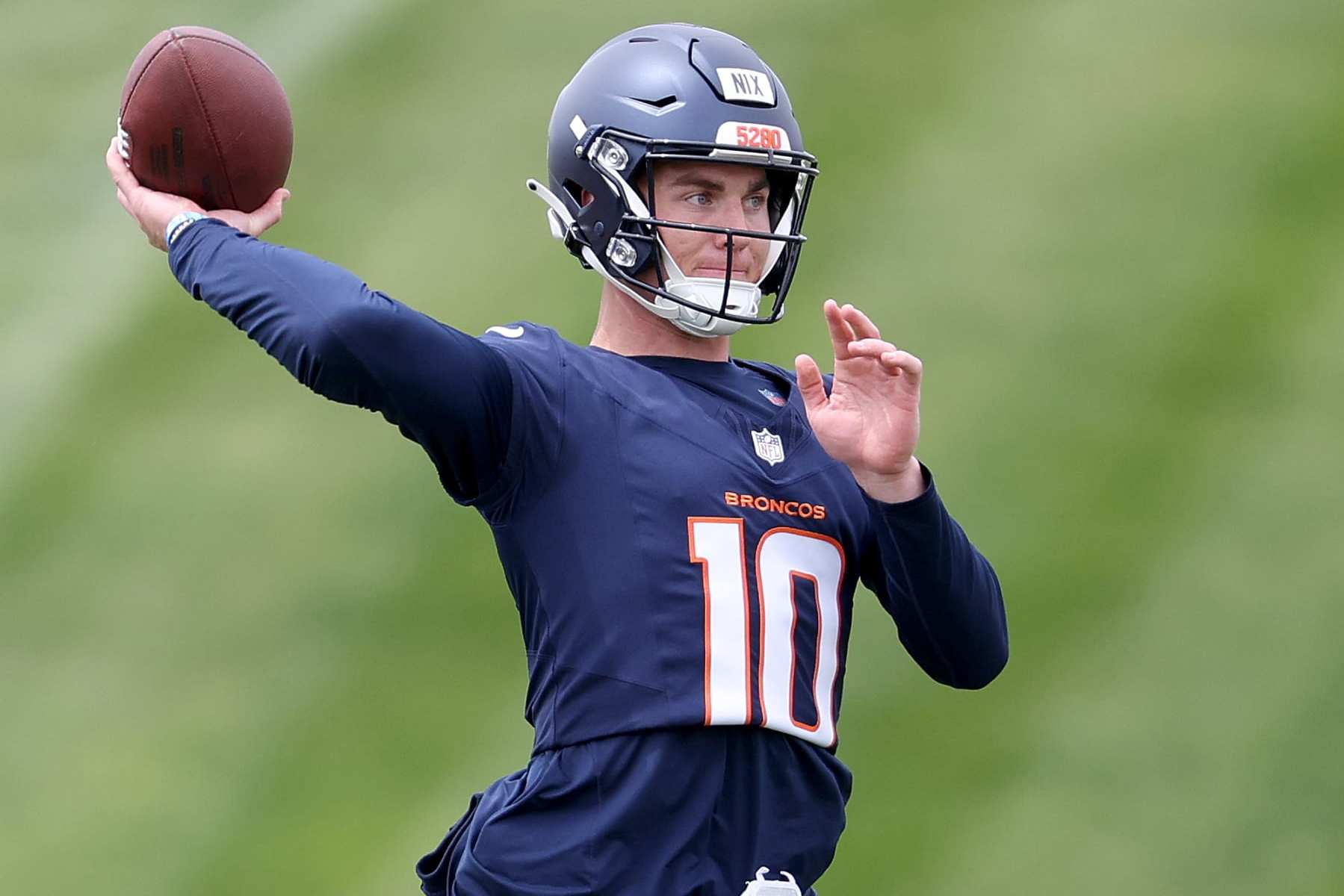 ENGLEWOOD, COLORADO - MAY 11: Quarterback Bo Nix #10 of the Denver Broncos throws during Denver Broncos Rookie Minicamp at Centura Health Training Center on May 11, 2024 in Englewood, Colorado. (Photo by Matthew Stockman/Getty Images)