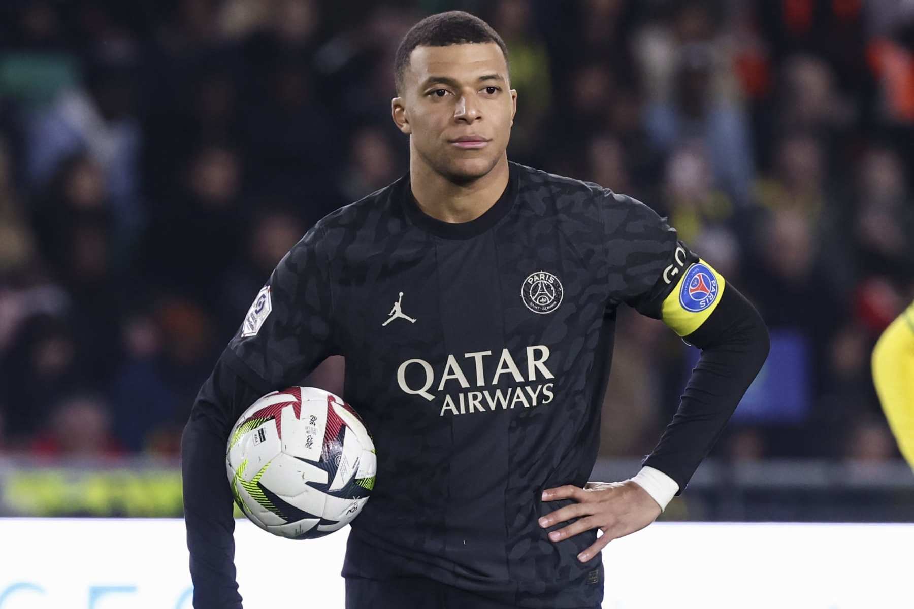 NANTES, FRANCE - FEBRUARY 17: Kylian Mbappe #7 of Paris Saint-Germain looks on during the Ligue 1 Uber Eats match between FC Nantes and Paris Saint-Germain at Stade de la Beaujoire on February 17, 2024 in Nantes, France. (Photo by Catherine Steenkeste/Getty Images)