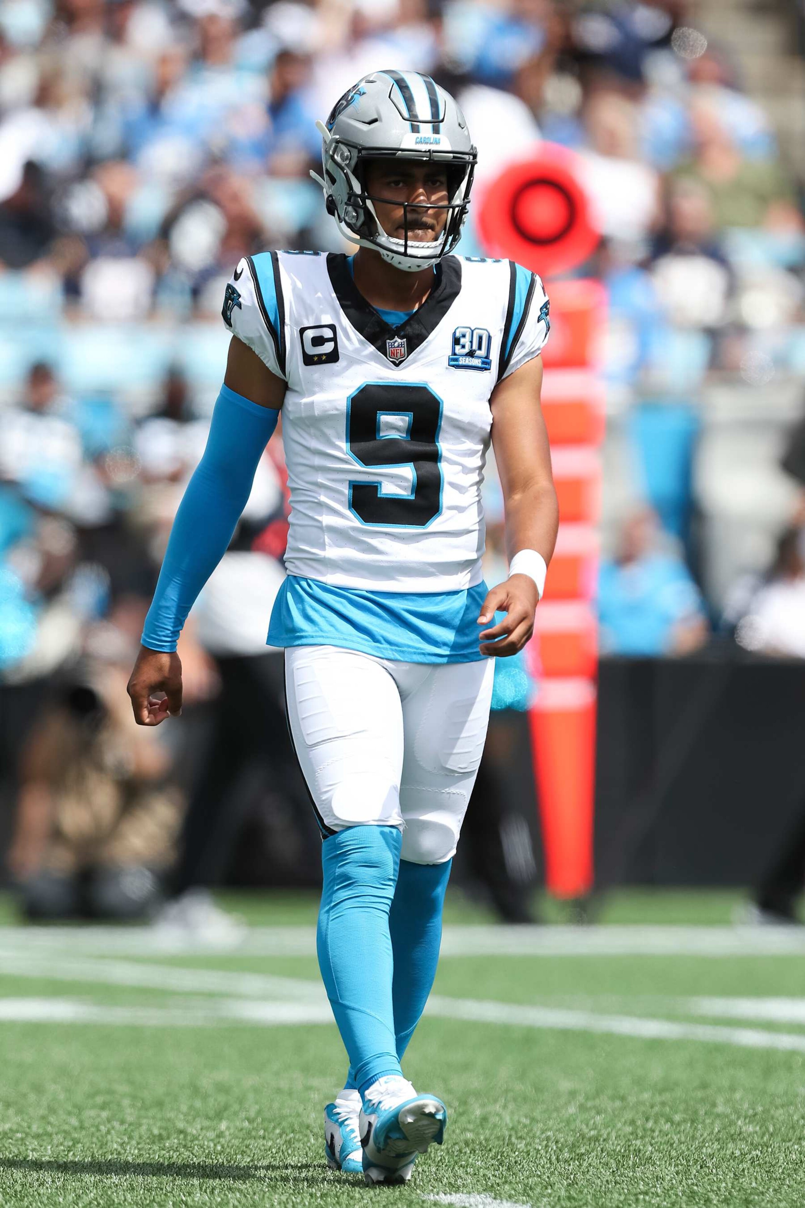 CHARLOTTE, NORTH CAROLINA - SEPTEMBER 15: Bryce Young #9 of the Carolina Panthers walks toward the sideline during a game against the Los Angeles Chargers at Bank of America Stadium on September 15, 2024 in Charlotte, North Carolina. The Chargers defeated the Panthers 26-3. (Kara Durrette/Getty Images)