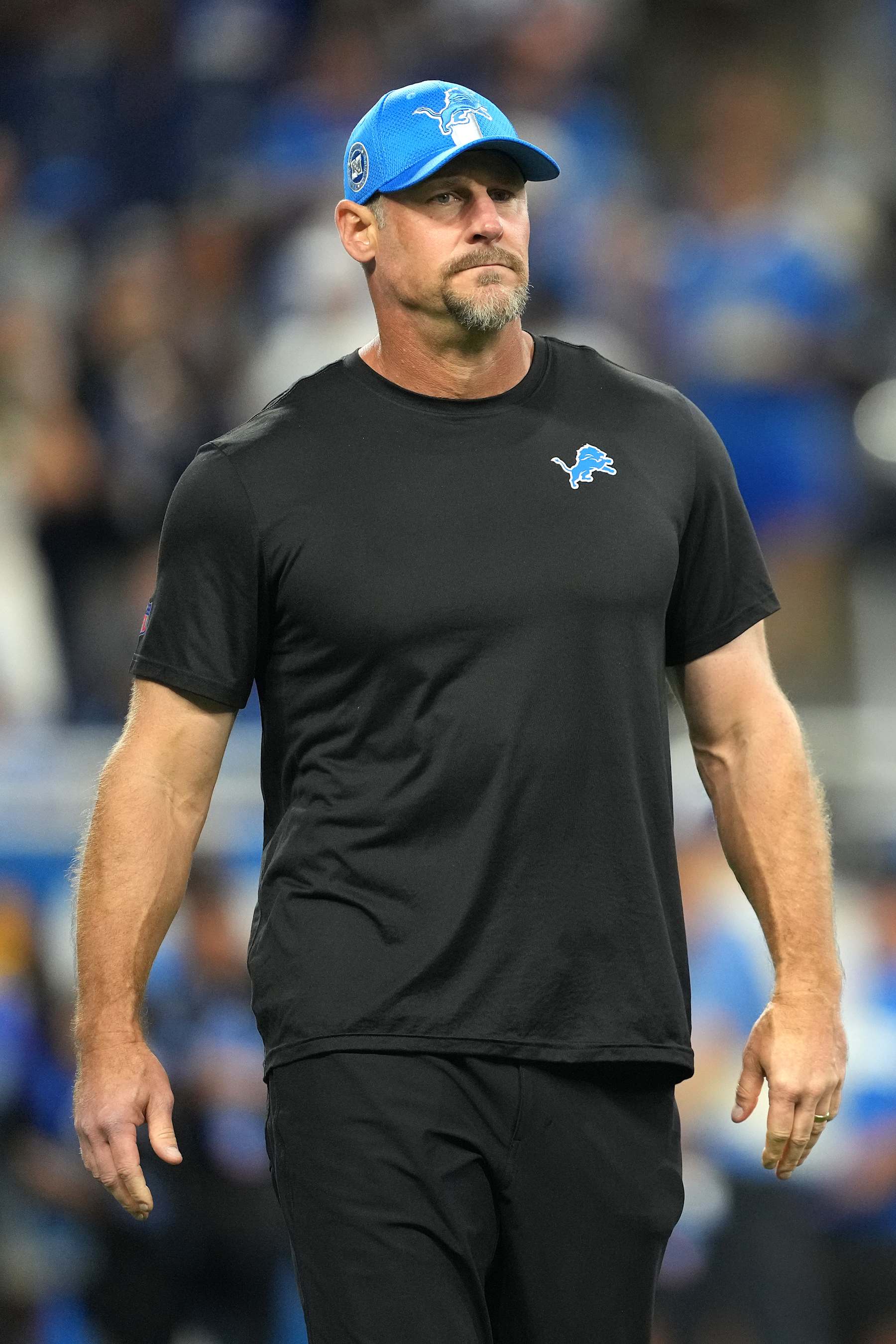 DETROIT, MICHIGAN - SEPTEMBER 15: Head coach Dan Campbell of the Detroit Lions looks on prior to a game against the Tampa Bay Buccaneers at Ford Field on September 15, 2024 in Detroit, Michigan. (Photo by Nic Antaya/Getty Images)