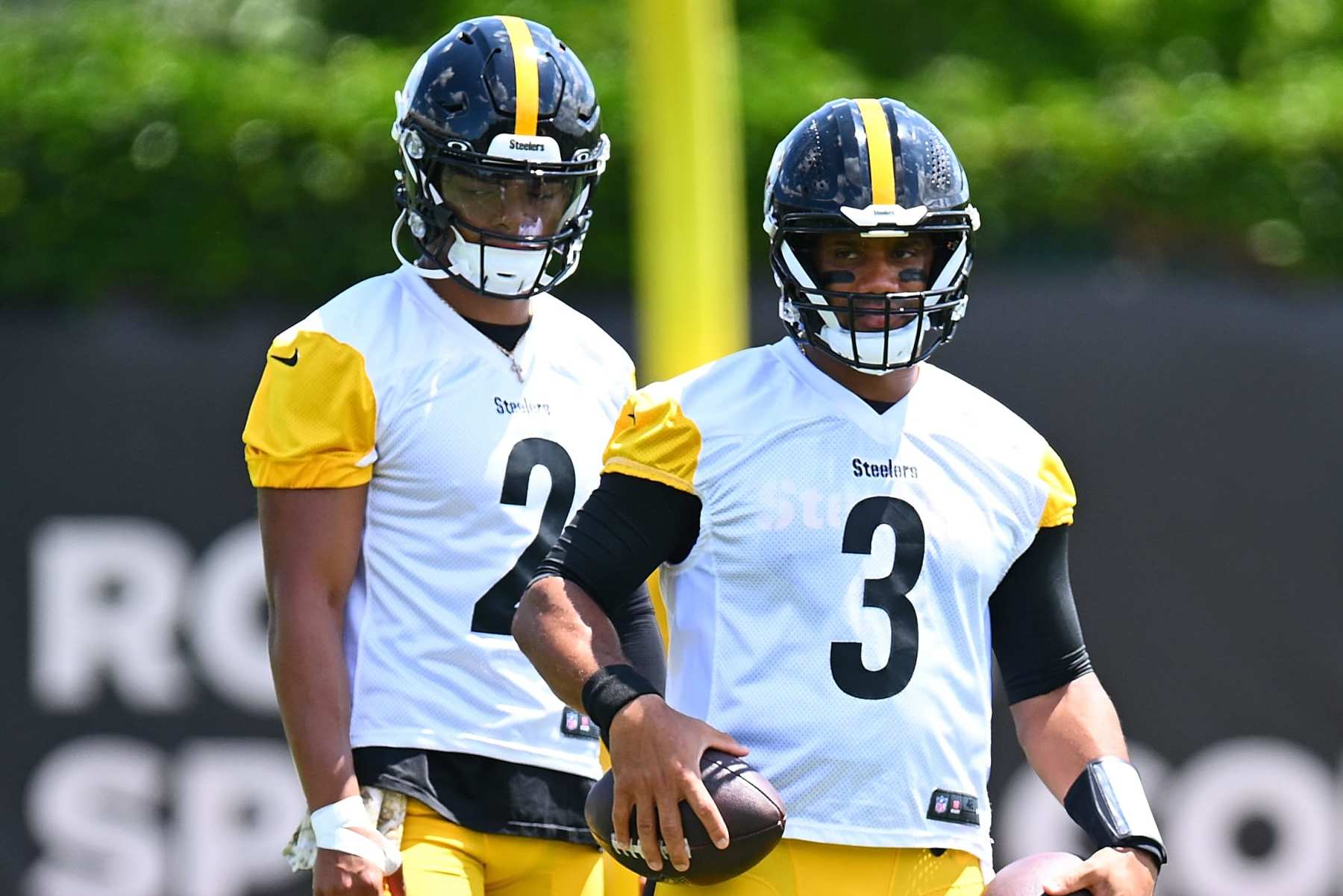 Pittsburgh Steelers quarterbacks Justin Fields (2) and Russell Wilson (3)