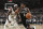 MILWAUKEE, WI - JUNE 13: Jrue Holiday #21 of the Milwaukee Bucks plays defense as Kyrie Irving #11 of the Brooklyn Nets handles the ball during the game during Round 2, Game 4 of the 2021 NBA Playoffs  on June 13, 2021 at the Fiserv Forum Center in Milwaukee, Wisconsin. NOTE TO USER: User expressly acknowledges and agrees that, by downloading and or using this Photograph, user is consenting to the terms and conditions of the Getty Images License Agreement. Mandatory Copyright Notice: Copyright 2021 NBAE (Photo by Gary Dineen/NBAE via Getty Images).