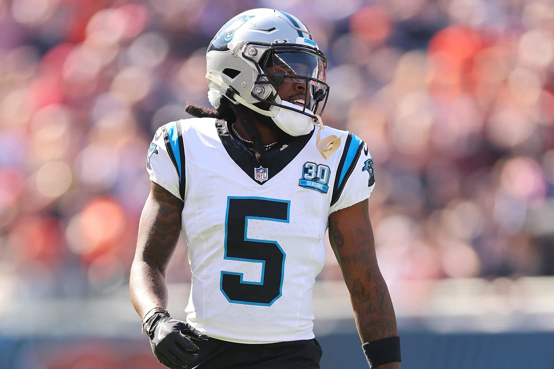 CHICAGO, ILLINOIS - OCTOBER 06: Diontae Johnson #5 of the Carolina Panthers looks on against the Chicago Bears at Soldier Field on October 06, 2024 in Chicago, Illinois. (Photo by Michael Reaves/Getty Images)
