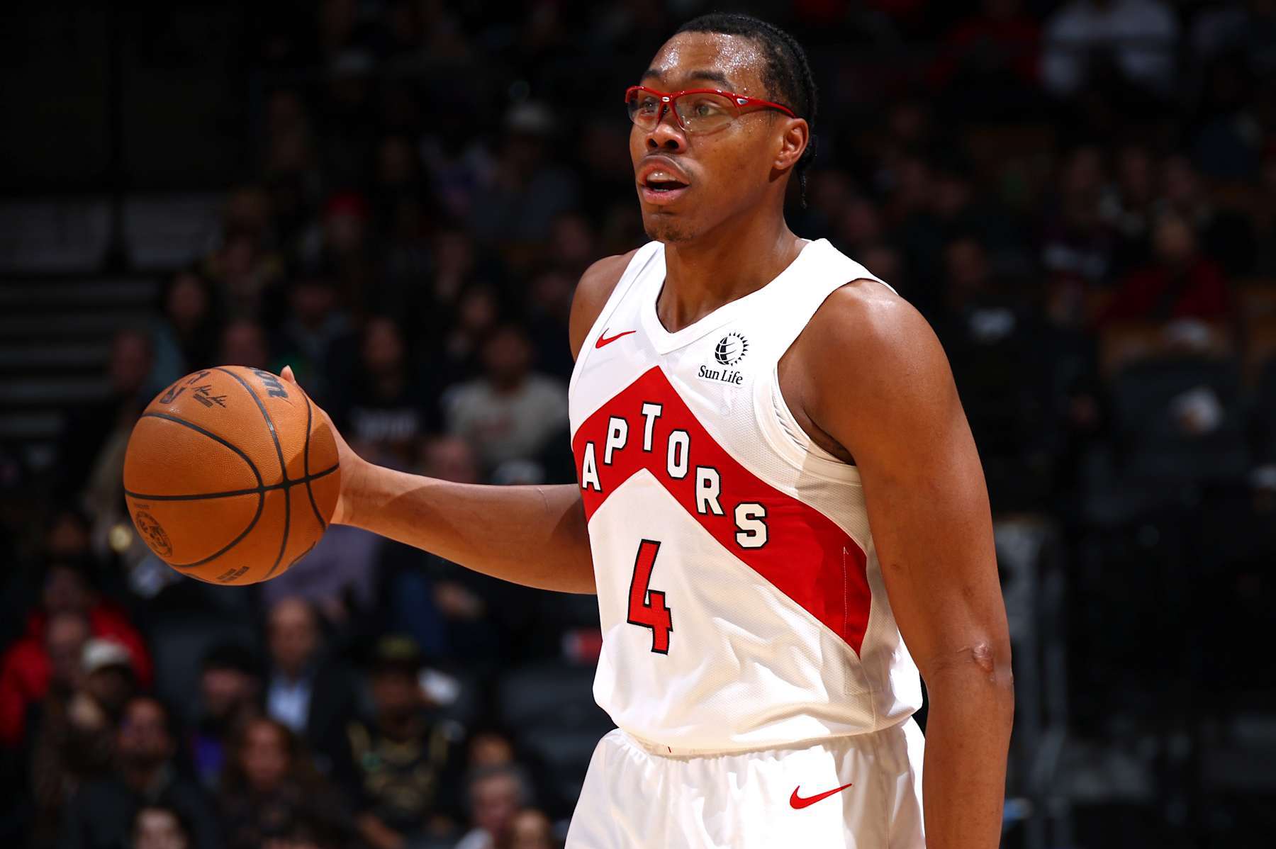 TORONTO, CANADA - DECEMBER 9: Scottie Barnes #4 of the Toronto Raptors looks on during the game against the New York Knicks on December 9, 2024 at the Scotiabank Arena in Toronto, Ontario, Canada.  NOTE TO USER: User expressly acknowledges and agrees that, by downloading and or using this Photograph, user is consenting to the terms and conditions of the Getty Images License Agreement.  Mandatory Copyright Notice: Copyright 2024 NBAE (Photo by Vaughn Ridley/NBAE via Getty Images)