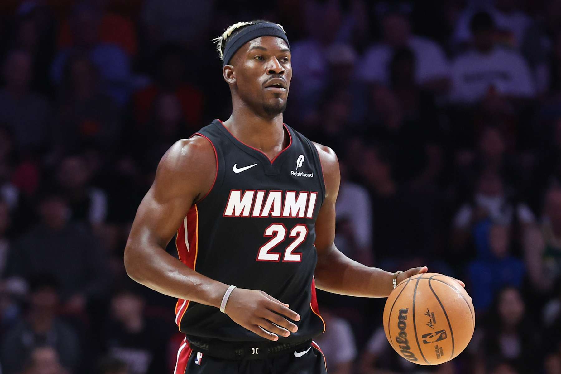 MIAMI, FLORIDA - JANUARY 19: Jimmy Butler #22 of the Miami Heat dribbles the ball against the San Antonio Spurs during the first quarter of the game at Kaseya Center on January 19, 2025 in Miami, Florida. NOTE TO USER: User expressly acknowledges and agrees that, by downloading and or using this photograph, User is consenting to the terms and conditions of the Getty Images License Agreement. (Photo by Megan Briggs/Getty Images)