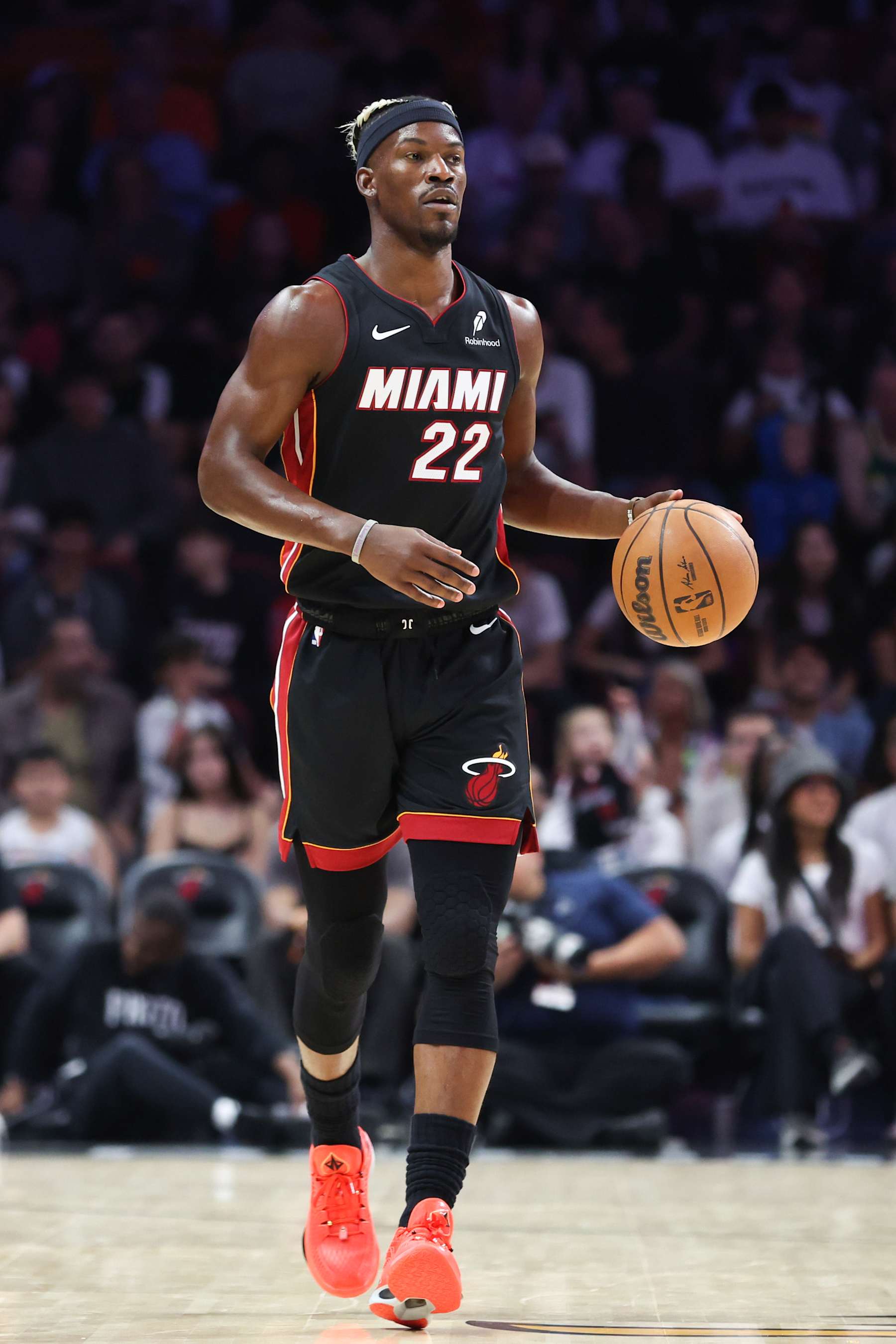 MIAMI, FLORIDA - JANUARY 19: Jimmy Butler #22 of the Miami Heat dribbles the ball against the San Antonio Spurs during the first quarter of the game at the Kaseya Center on January 19, 2025 in Miami, Florida. NOTE TO USER: User expressly acknowledges and agrees that, by downloading and/or using this photo, User agrees to the terms and conditions of the Getty Images License Agreement. (Photo by Megan Briggs/Getty Images)