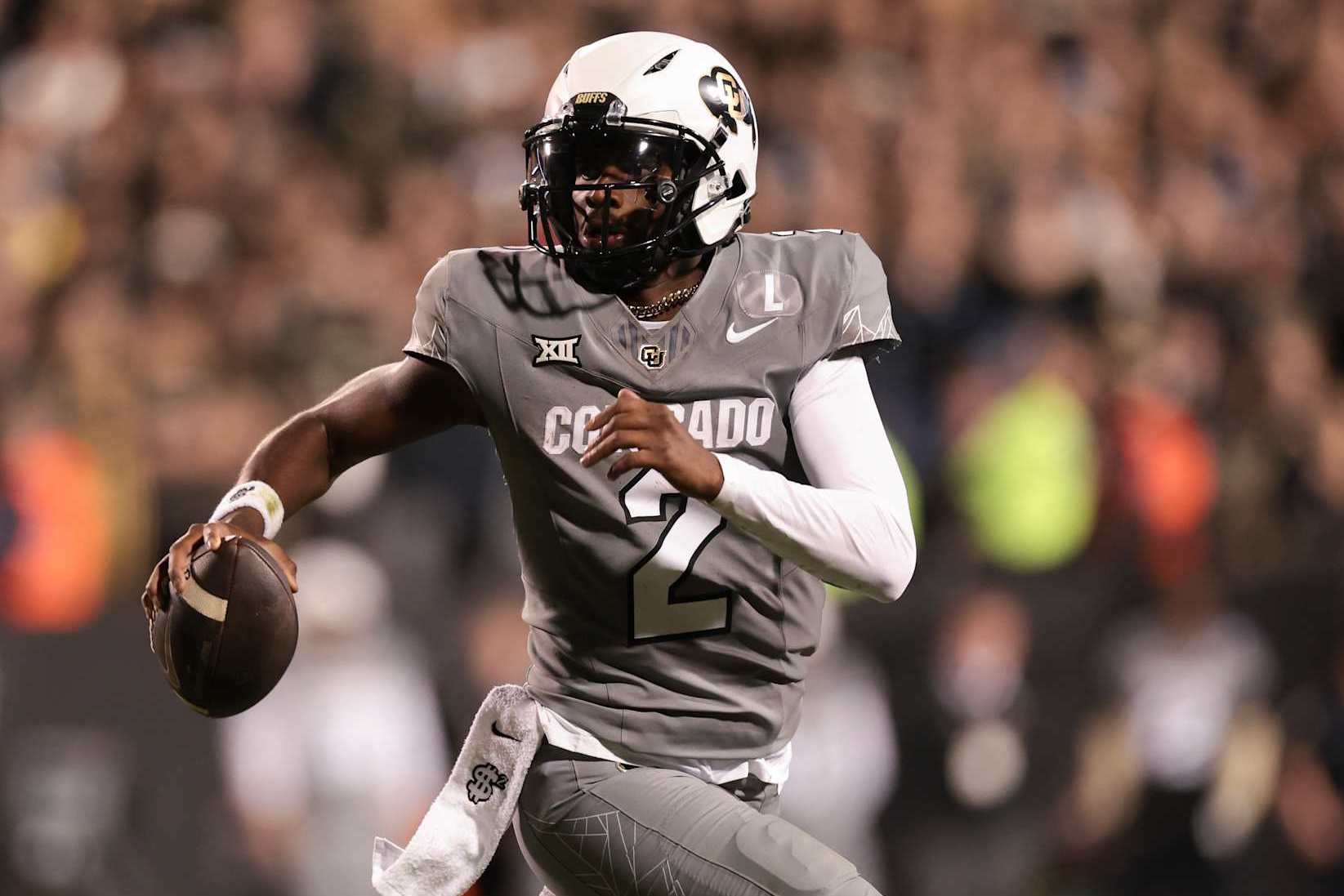 BOULDER, COLORADO - OCTOBER 26: Shedeur Sanders #2 of the Colorado Buffaloes runs with the ball during the second quarter against the Cincinnati Bearcats at Folsom Field on October 26, 2024 in Boulder, Colorado. (Photo by Andrew Wevers/Getty Images)