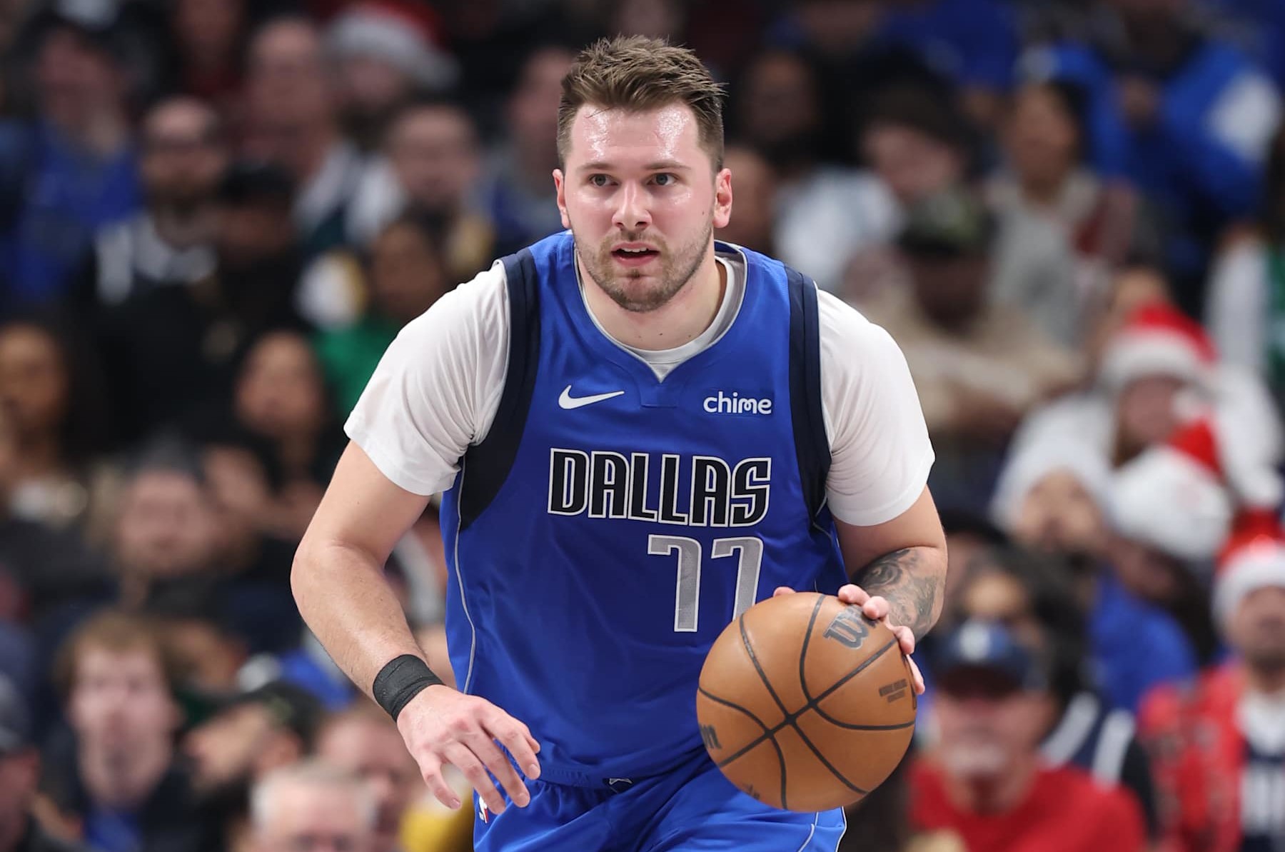 DALLAS, TX - DECEMBER 25: Luka Doncic #77 of the Dallas Mavericks dribbles the ball during the game against the Minnesota Timberwolves on December 25, 2024 at American Airlines Center in Dallas, Texas. NOTE TO USER: User expressly acknowledges and agrees that, by downloading and or using this photograph, User is consenting to the terms and conditions of the Getty Images License Agreement. Mandatory Copyright Notice: Copyright 2024 NBAE (Photo by David Sherman/NBAE via Getty Images)