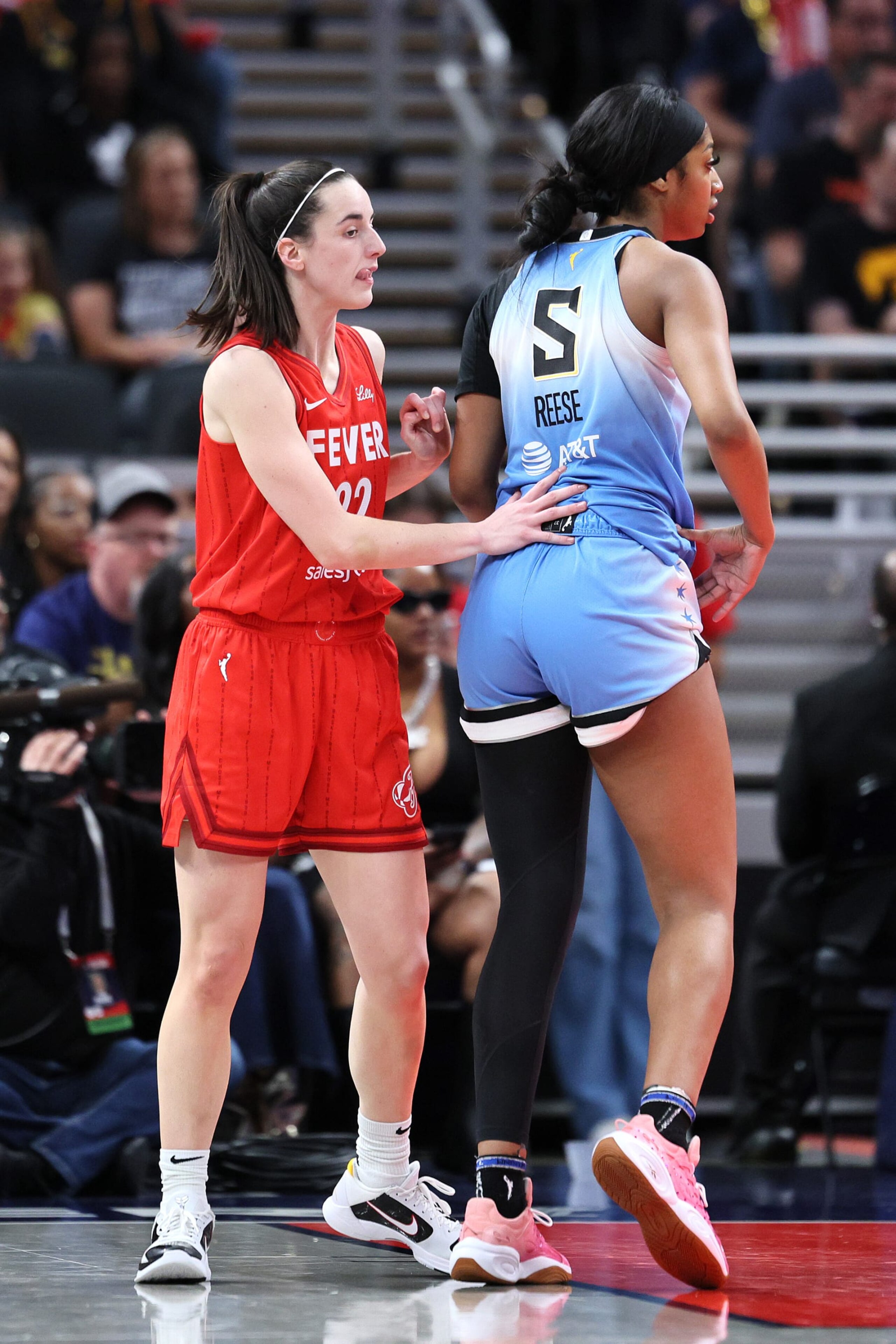 INDIANAPOLIS, INDIANA - JUNE 01: Caitlin Clark #22 of the Indiana Fever battles for position against Angel Reese #5 of the Chicago Sky during the second quarter in the game at Gainbridge Fieldhouse on June 01, 2024 in Indianapolis, Indiana. NOTE TO USER: User expressly acknowledges and agrees that, by downloading and or using this photograph, User is consenting to the terms and conditions of the Getty Images License Agreement. (Photo by Andy Lyons/Getty Images)