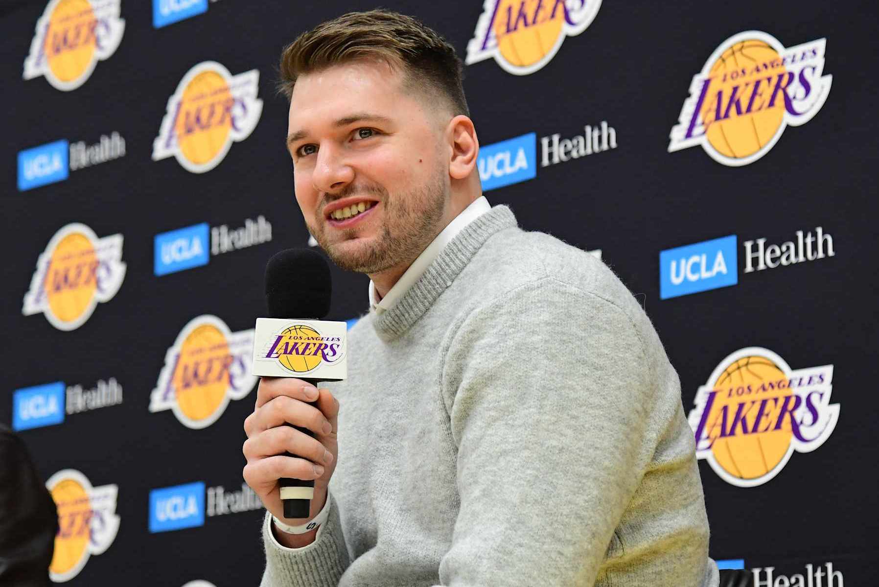 EL SEGUNDO, CA - FEBRUARY 04: Luka Doncic #77 of the Los Angeles Lakers is introduced during a press conference on February 04, 2025 at UCLA Health Training Center in El Segundo, California. NOTE TO USER: User expressly acknowledges and agrees that, by downloading and or using this photograph, User is consenting to the terms and conditions of the Getty Images License Agreement. Mandatory Copyright Notice: Copyright 2025 NBAE (Photo by Adam Pantozzi/NBAE via Getty Images)