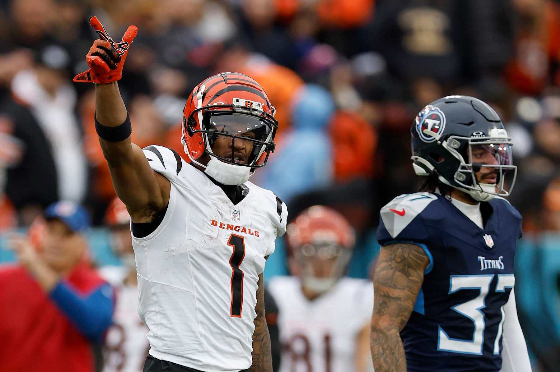 NASHVILLE, TENNESSEE - DECEMBER 15: Ja'Marr Chase #1 of the Cincinnati Bengals reacts after a first down during the second quarter against the Tennessee Titans at Nissan Stadium on December 15, 2024 in Nashville, Tennessee. (Photo by Wesley Hitt/Getty Images)
