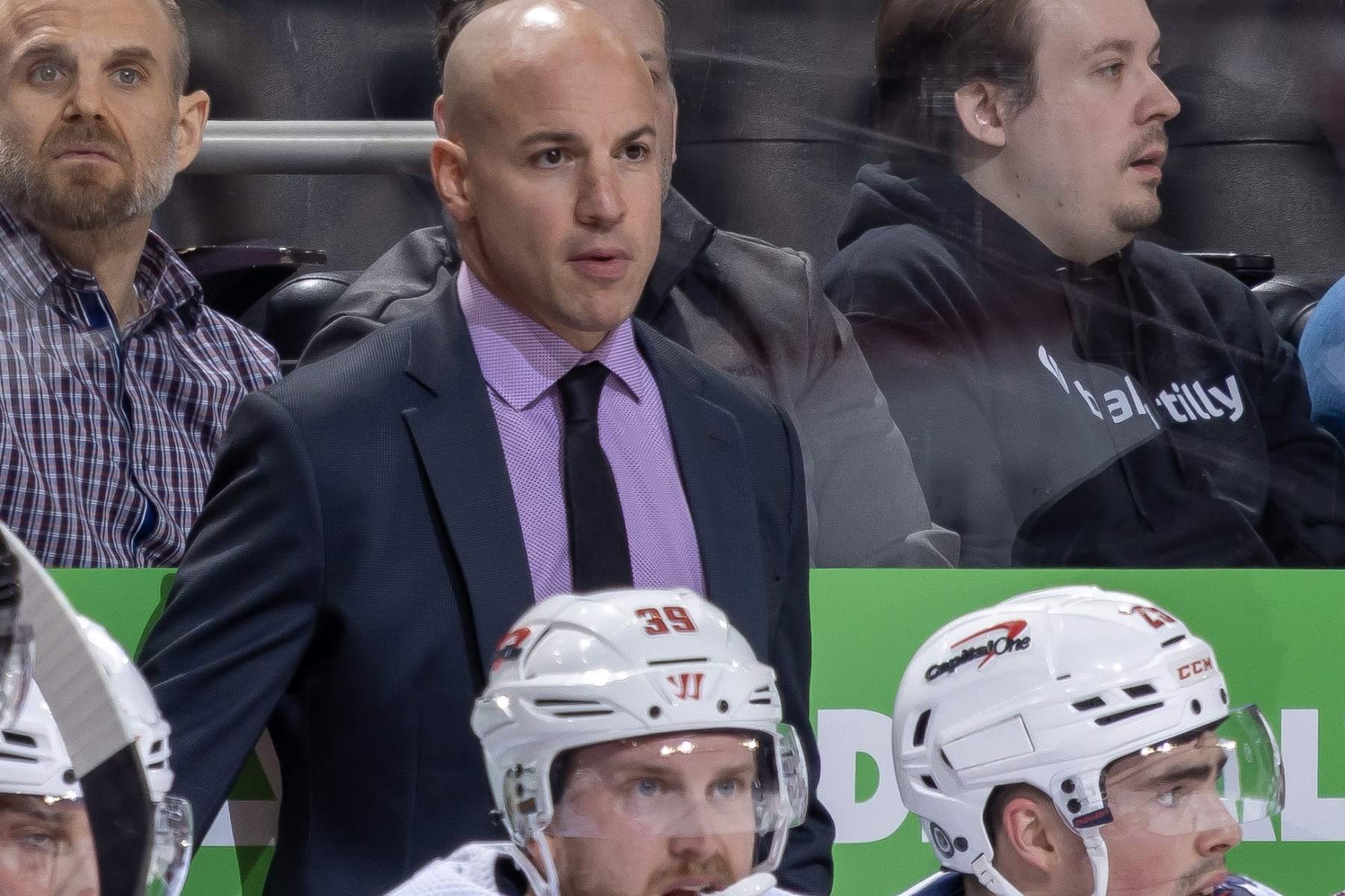 DETROIT, MI - FEBRUARY 27: Head Coach Spencer Carbery of the Washington Capitals looks on during the second period against the Detroit Red Wings at Little Caesars Arena on February 27, 2024 in Detroit, Michigan. Detroit defeated Washington 8-3. (Photo by Dave Reginek/NHLI via Getty Images)